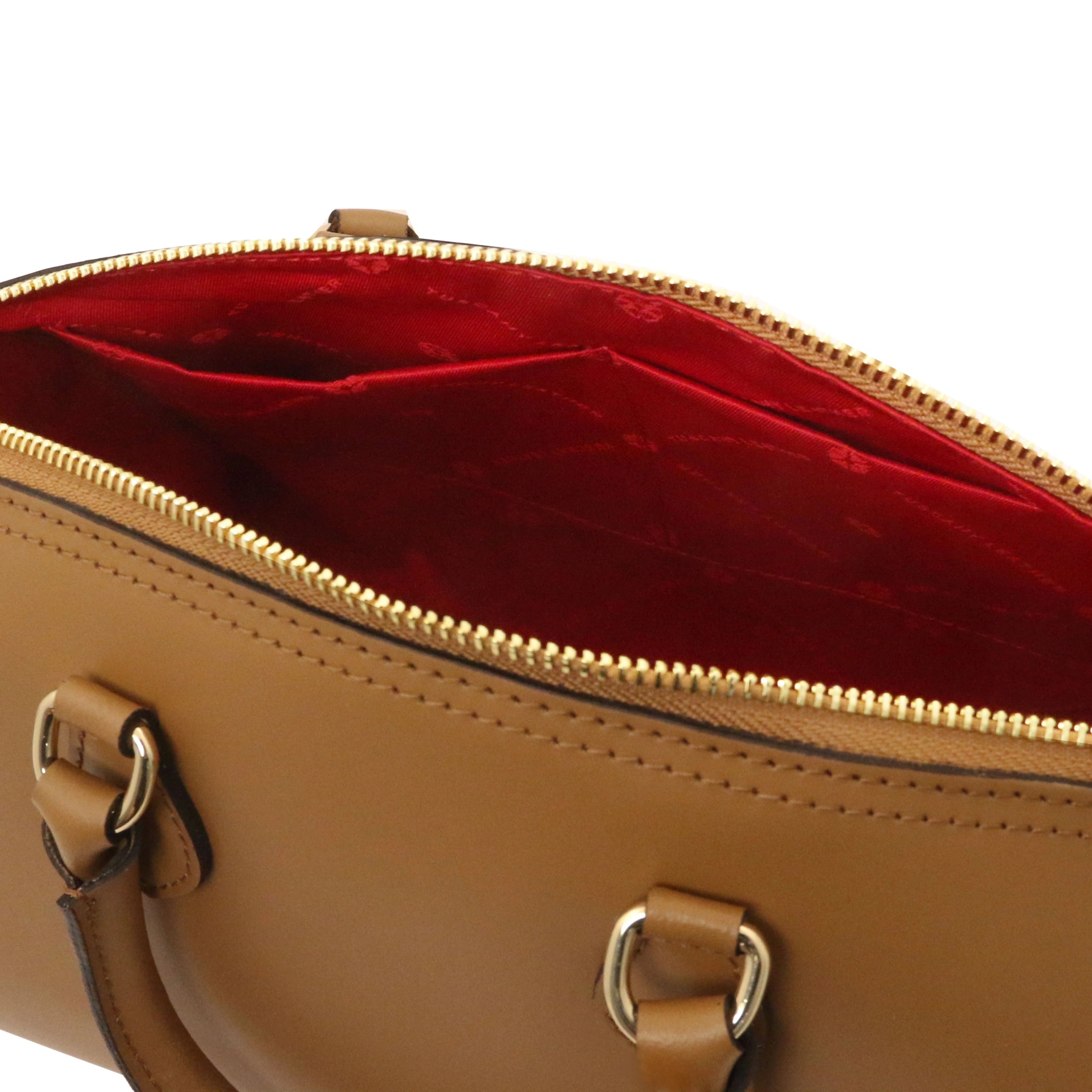 Interior open pockets view of Layla Italian Leather Duffle Bag in cognac showing the vibrant red lining