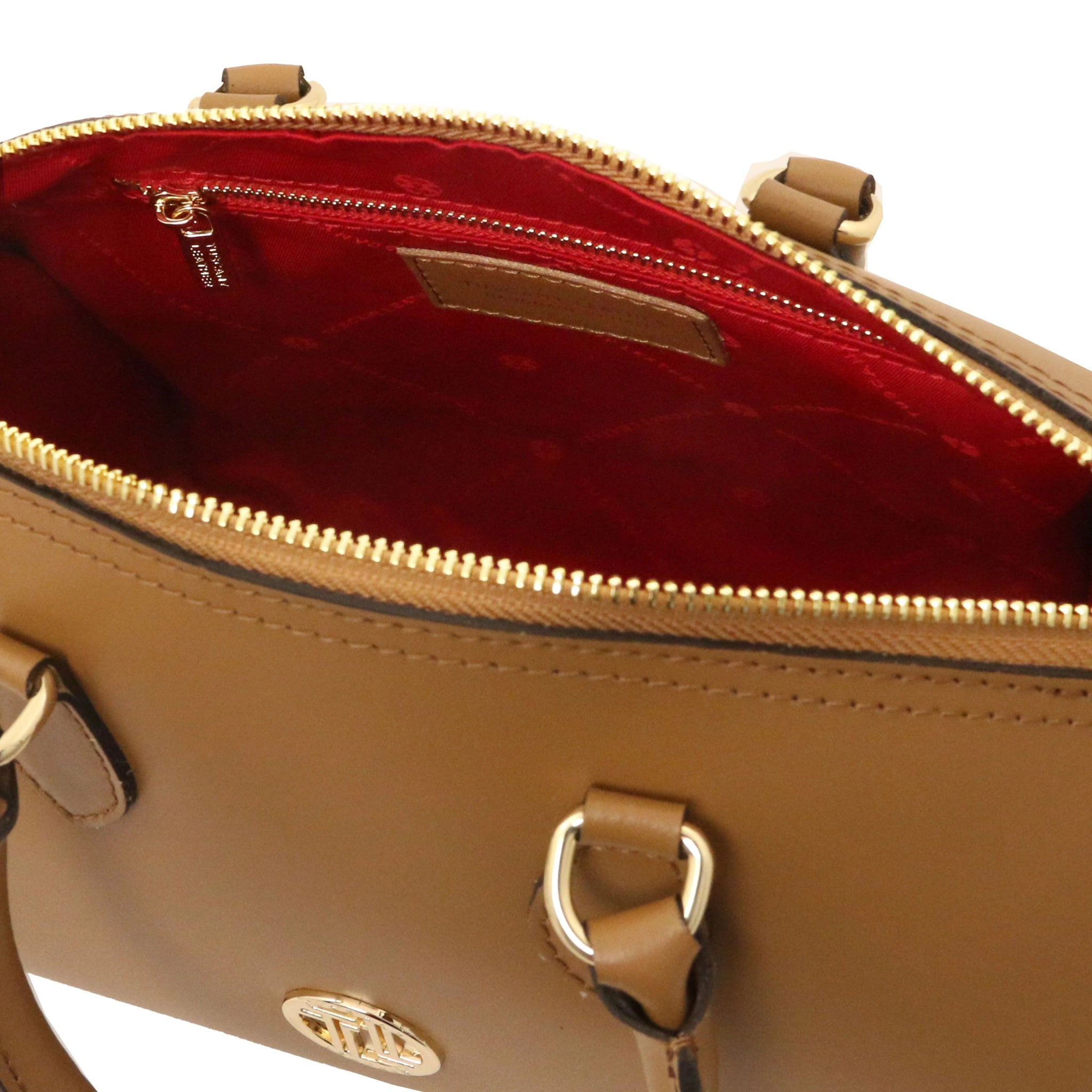 Interior zip pocket view of Layla Italian Leather Duffle Bag in cognac showing the vibrant red liningl