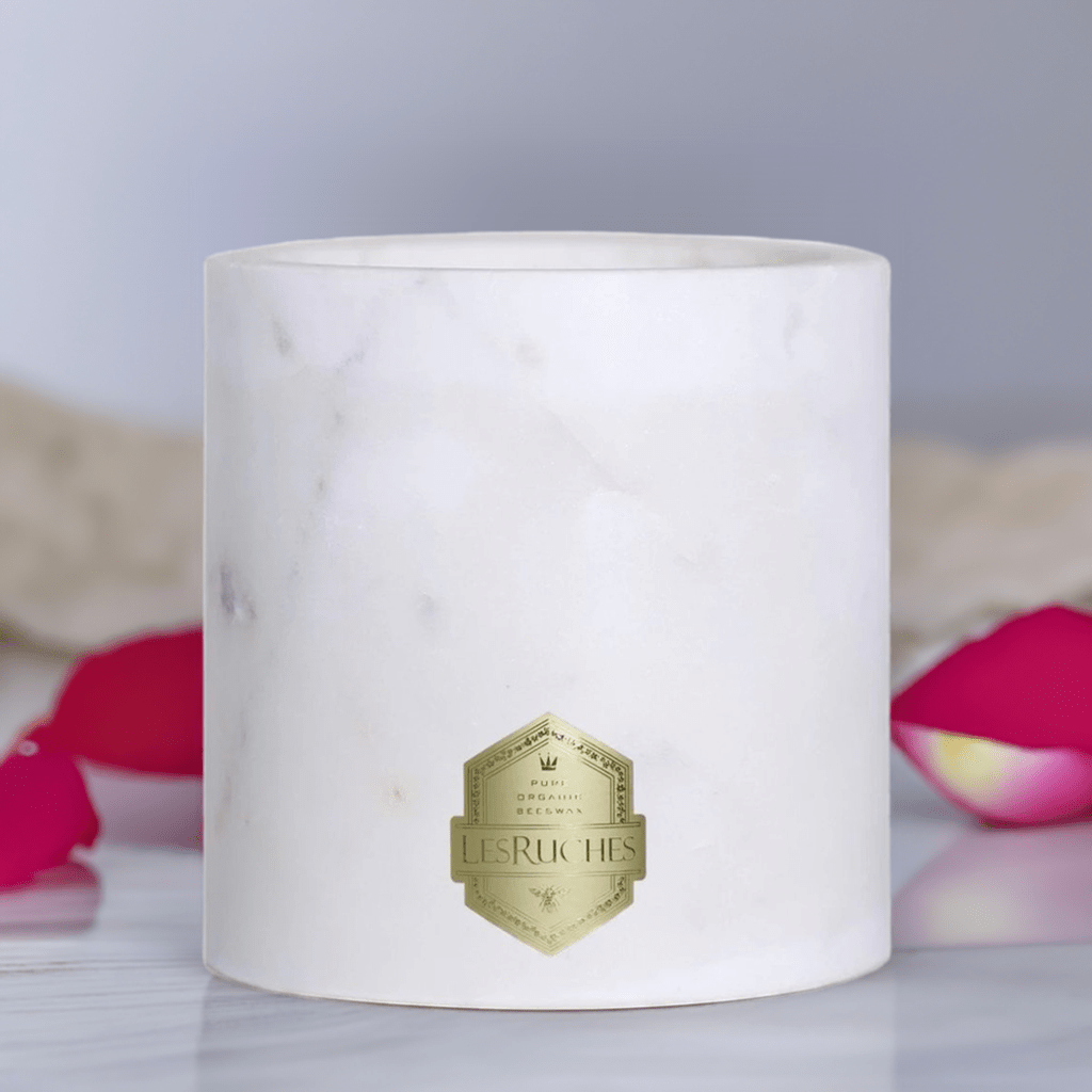 Le Tabac Grandé M2 Edition Marbré White Candle 54 oz on red floral background