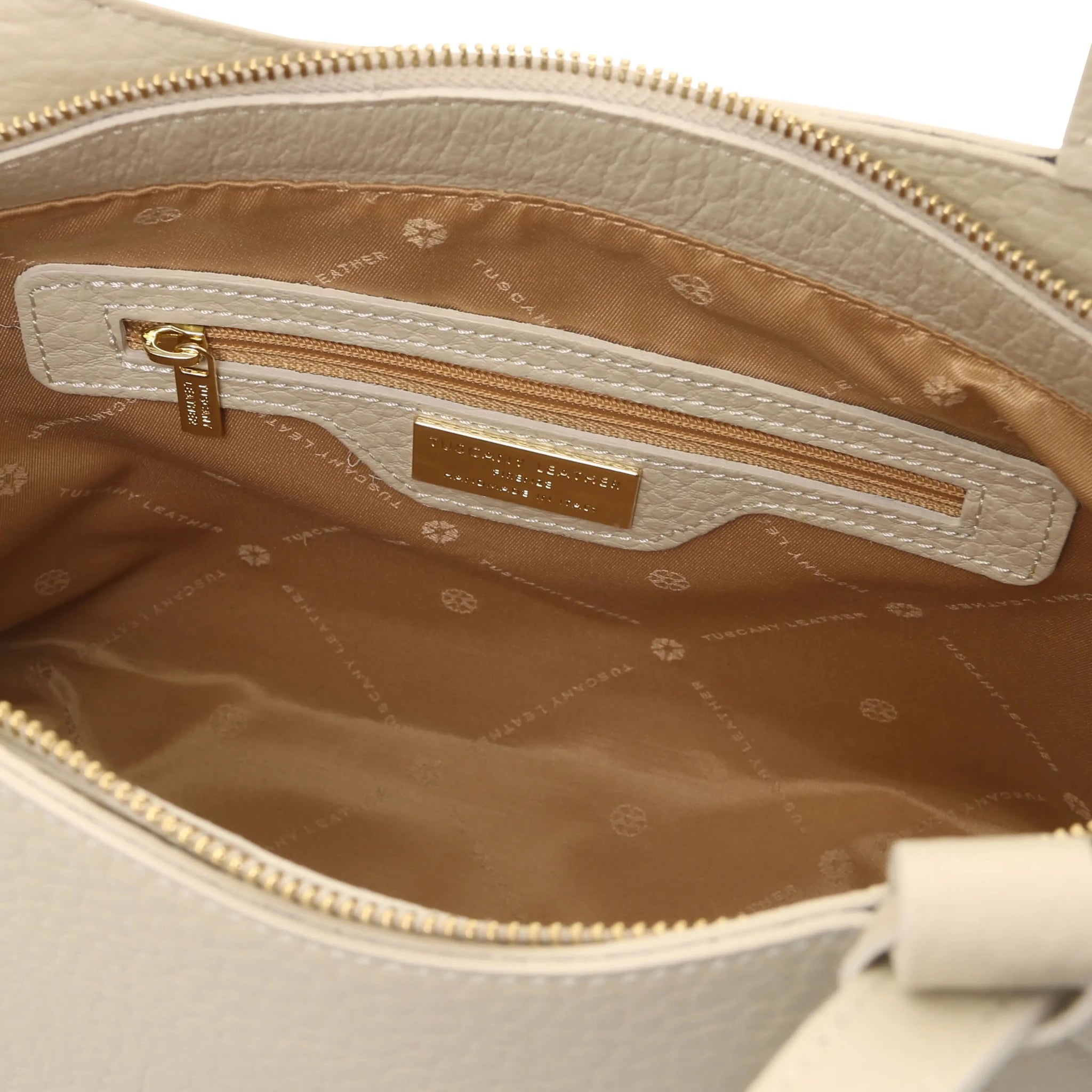 Interior zip pocket view Libra Leather Shoulder Bag in beige with beige lining