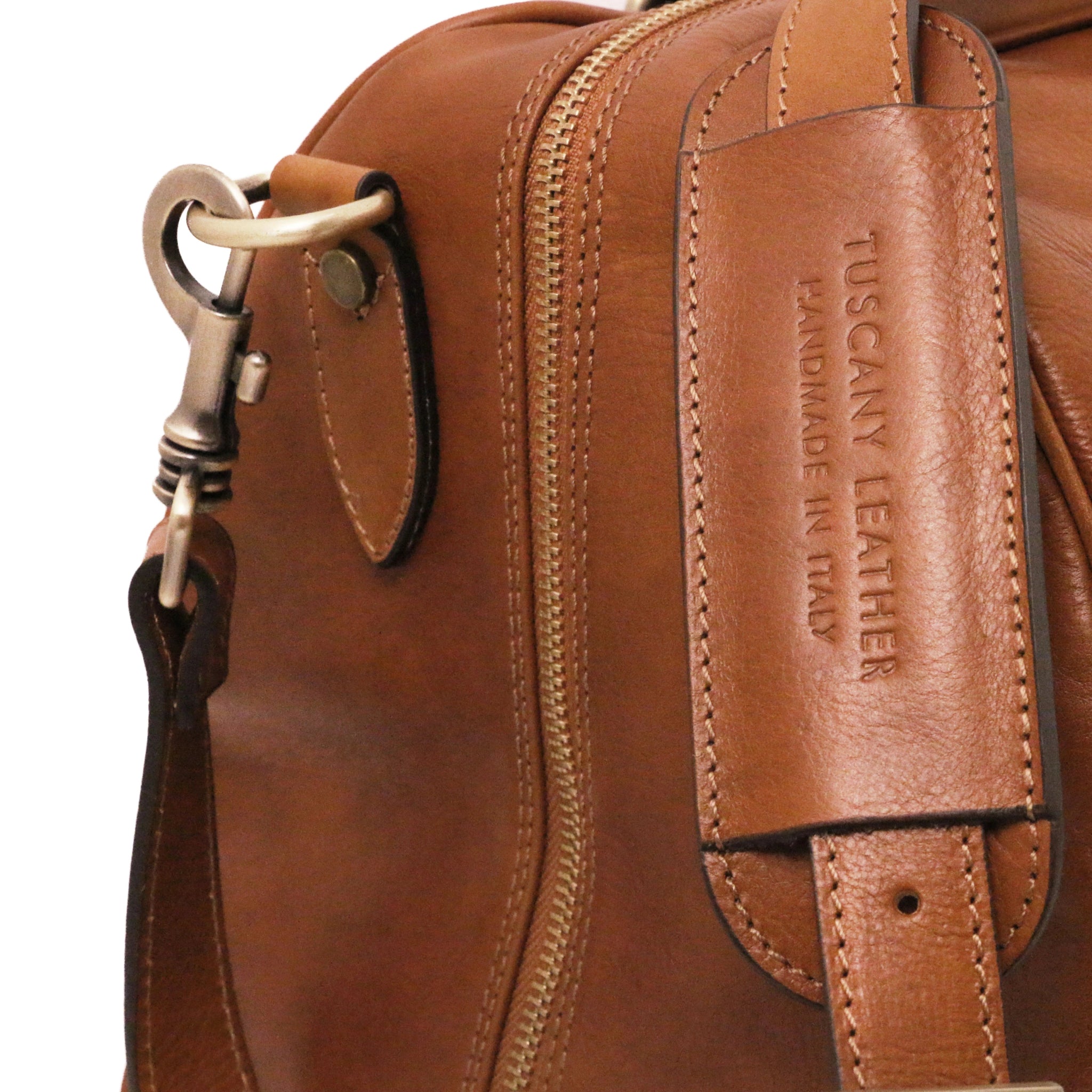Lisbona Travel Italian Matte Leather Small Duffle Bag in Natural close up of Luggage Tag