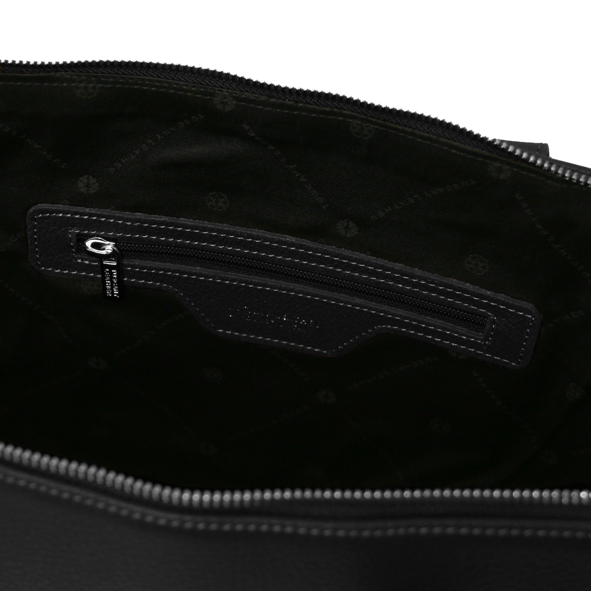 Interior zippered pocket view Magnolia Italian Leather Business Bag in cognac showing black bag lining