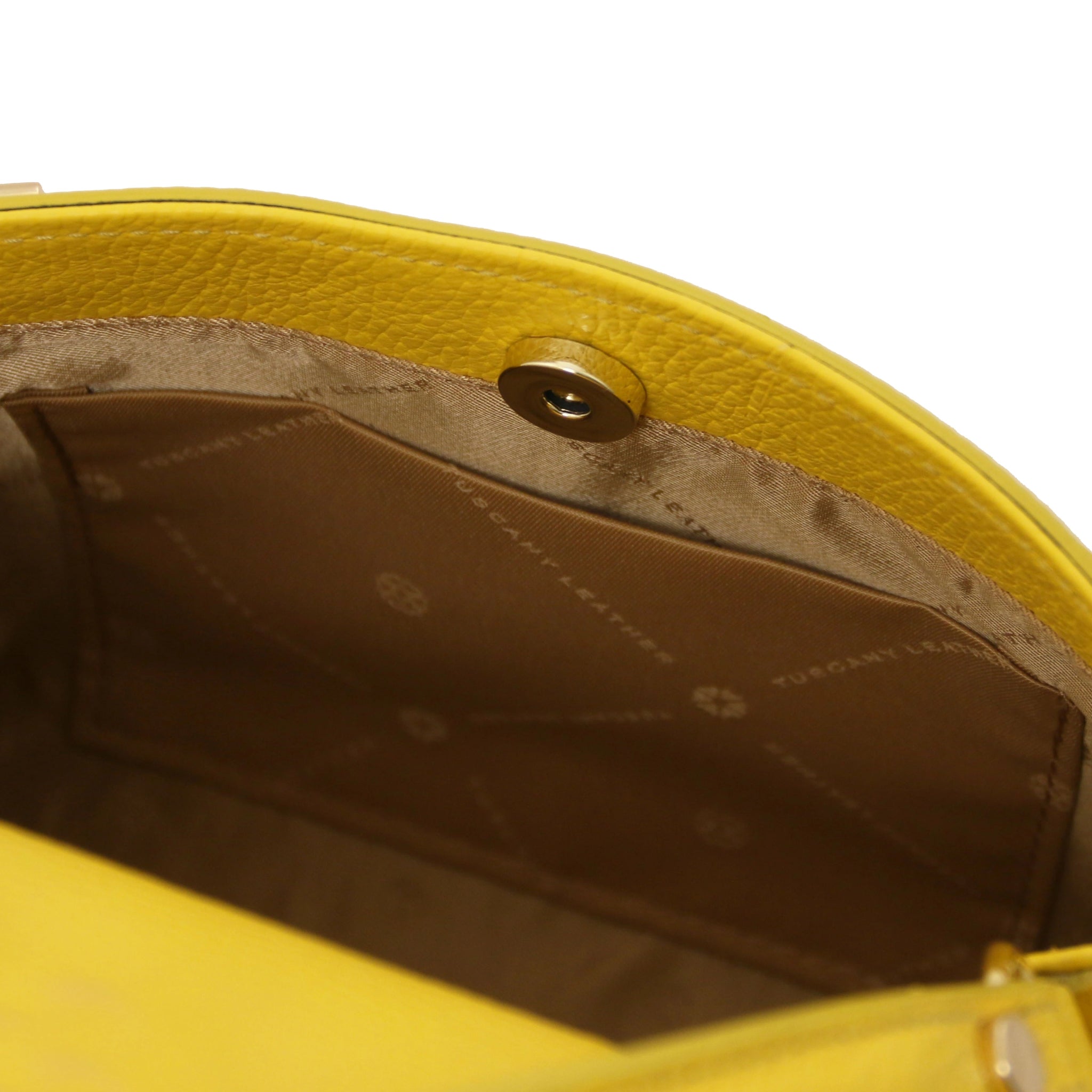 Interior zip pocket view Maisy Italian Leather Small Tote Bag in pastel yellow showing beige lining