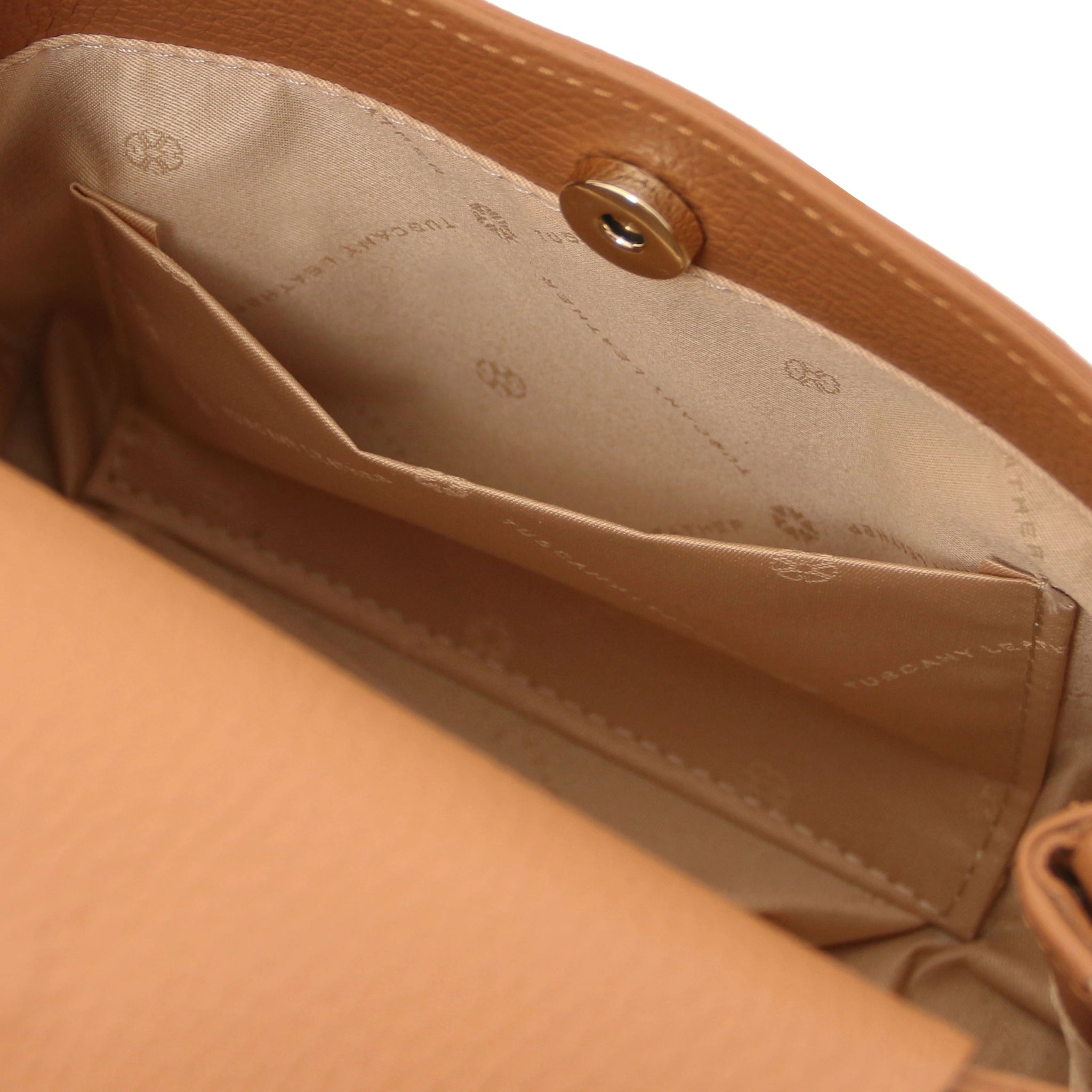 Interior Open Pocket View Maisy Italian Leather Small Tote Bag in Caramel showing beige lining