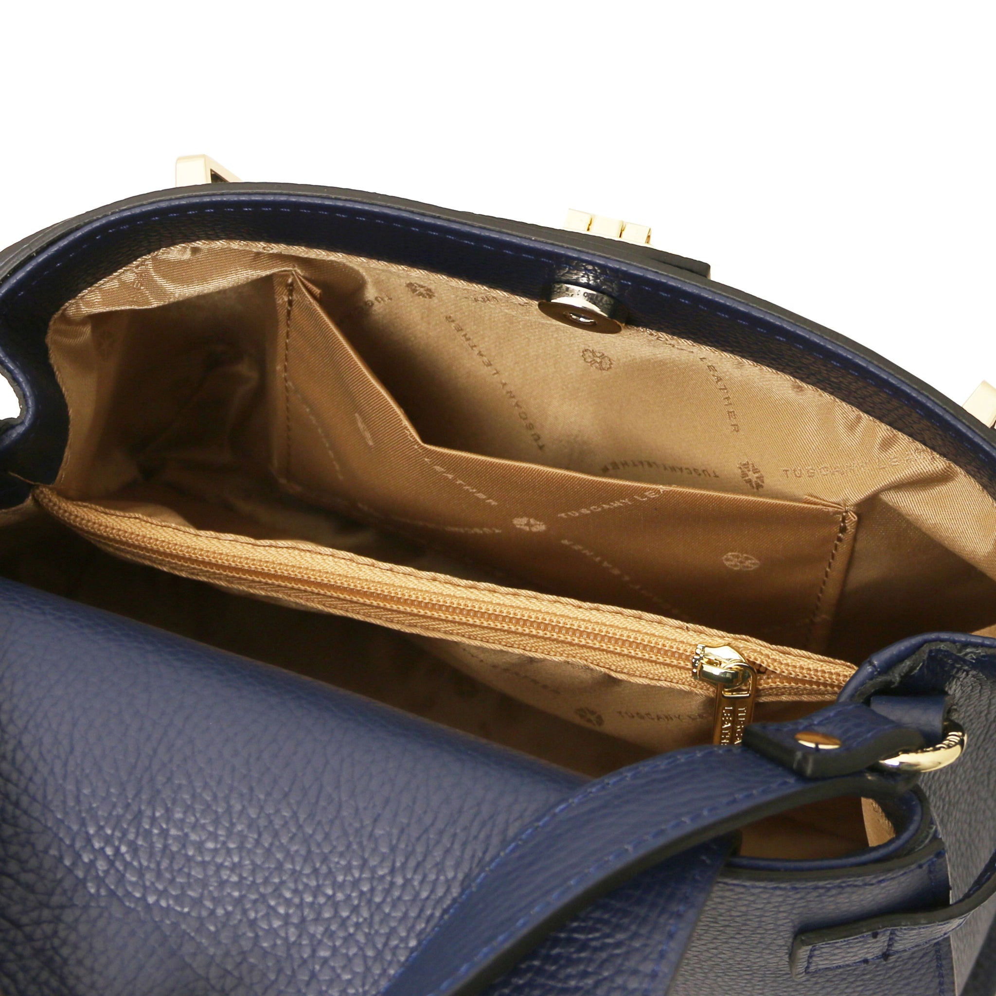 Interior opened pocket view Maisy Italian Leather Tote Bag in Dark Blue showing the beige bag lining