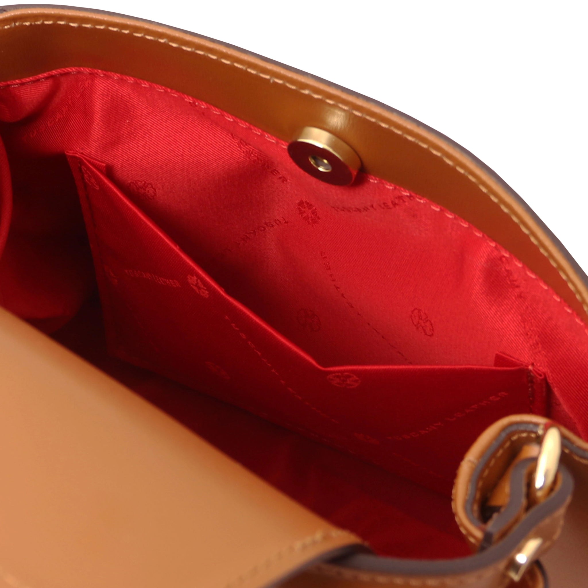 Interior opened pocket view Maisy Italian Leather Tote Bag in Cognac showing the beige bag lining