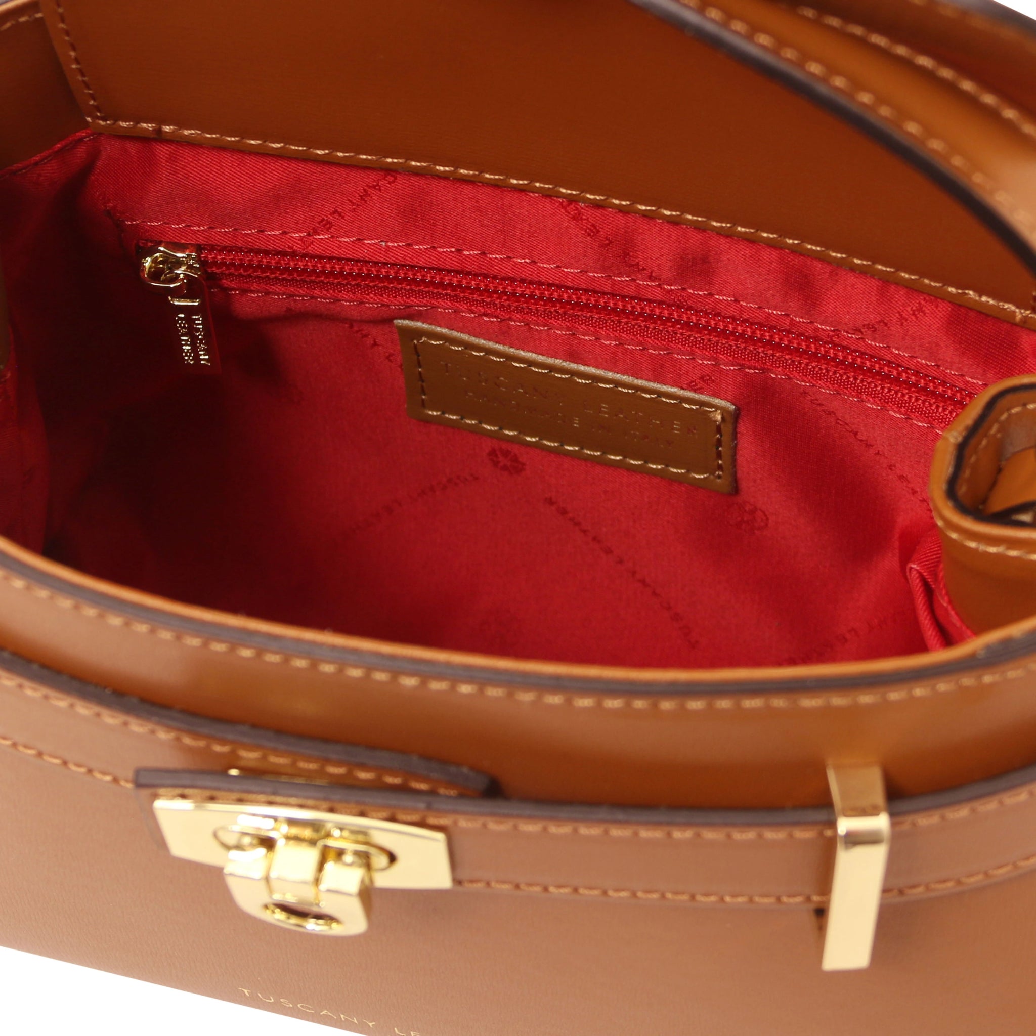Interior zippered pocket view Maisy Italian Leather Tote Bag in Cognac showing the beige bag lining