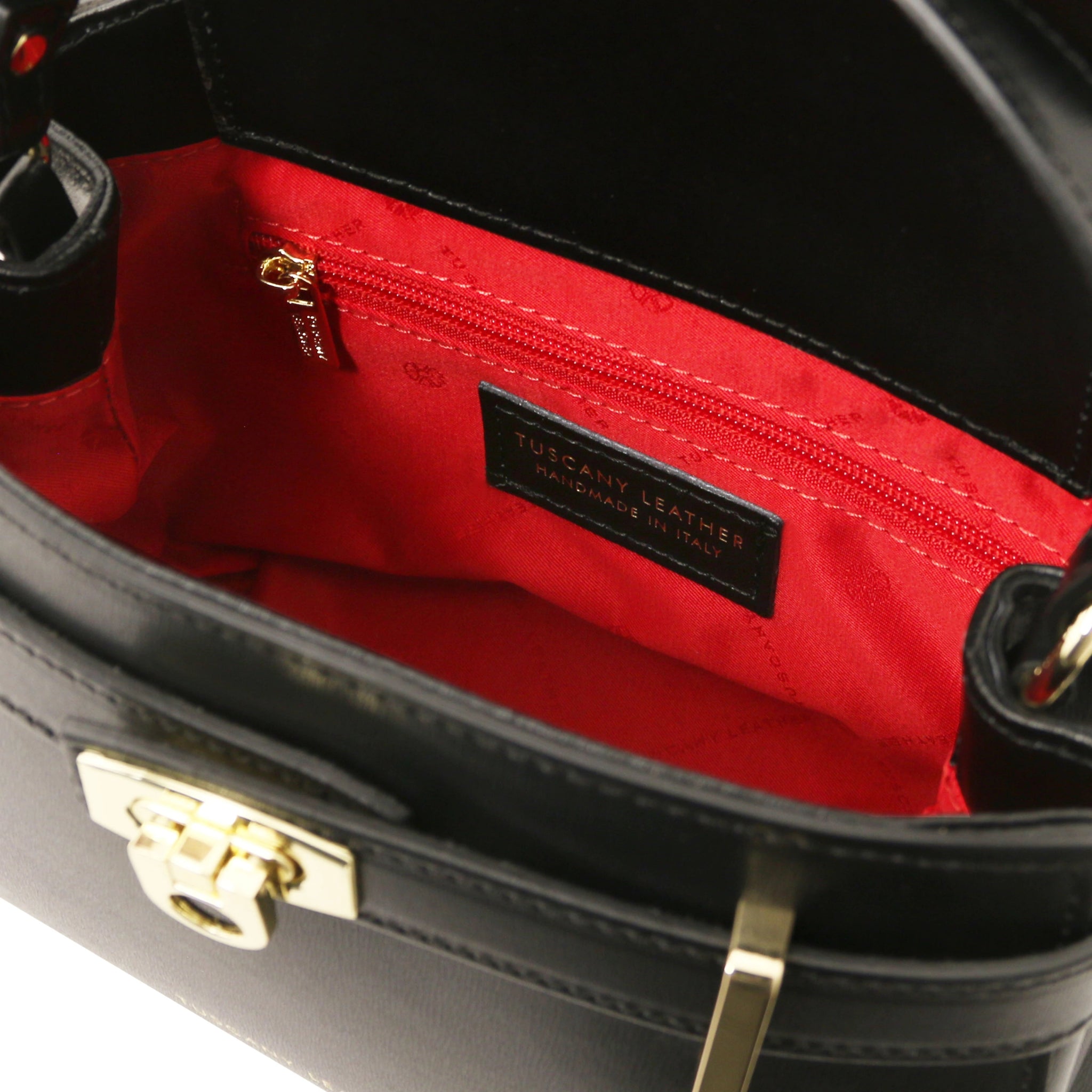Interior zippered pocket view Maisy Italian Leather Tote Bag in Black showing the red bag lining