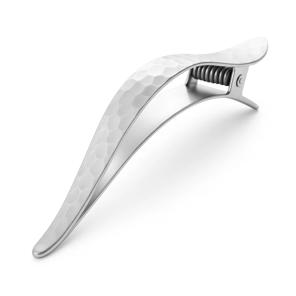 Matte Textured Hammered Hair Clip in silver on a white background
