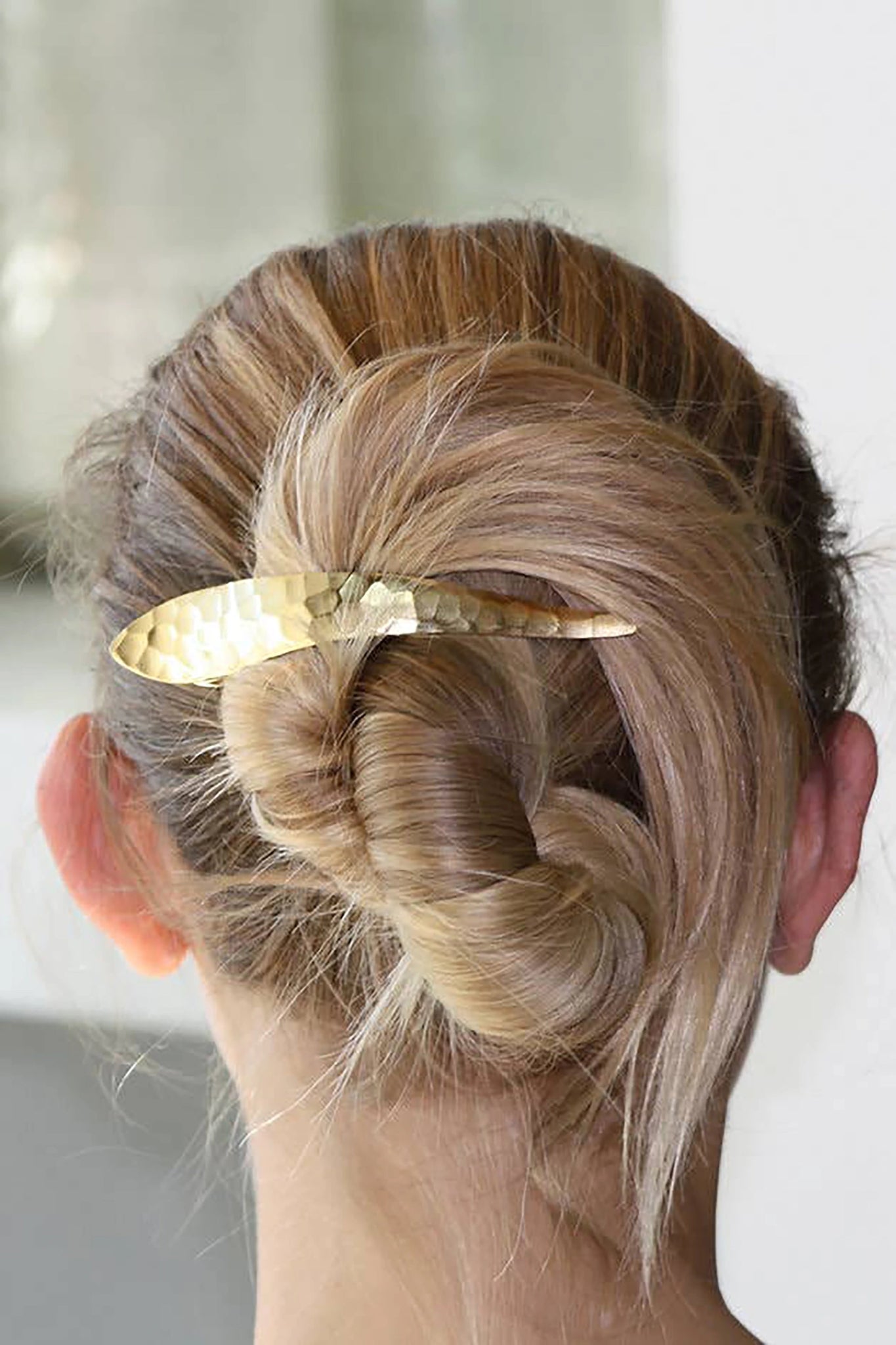 Hammered Gold Hair Clip on a blonde hair woman's french twist