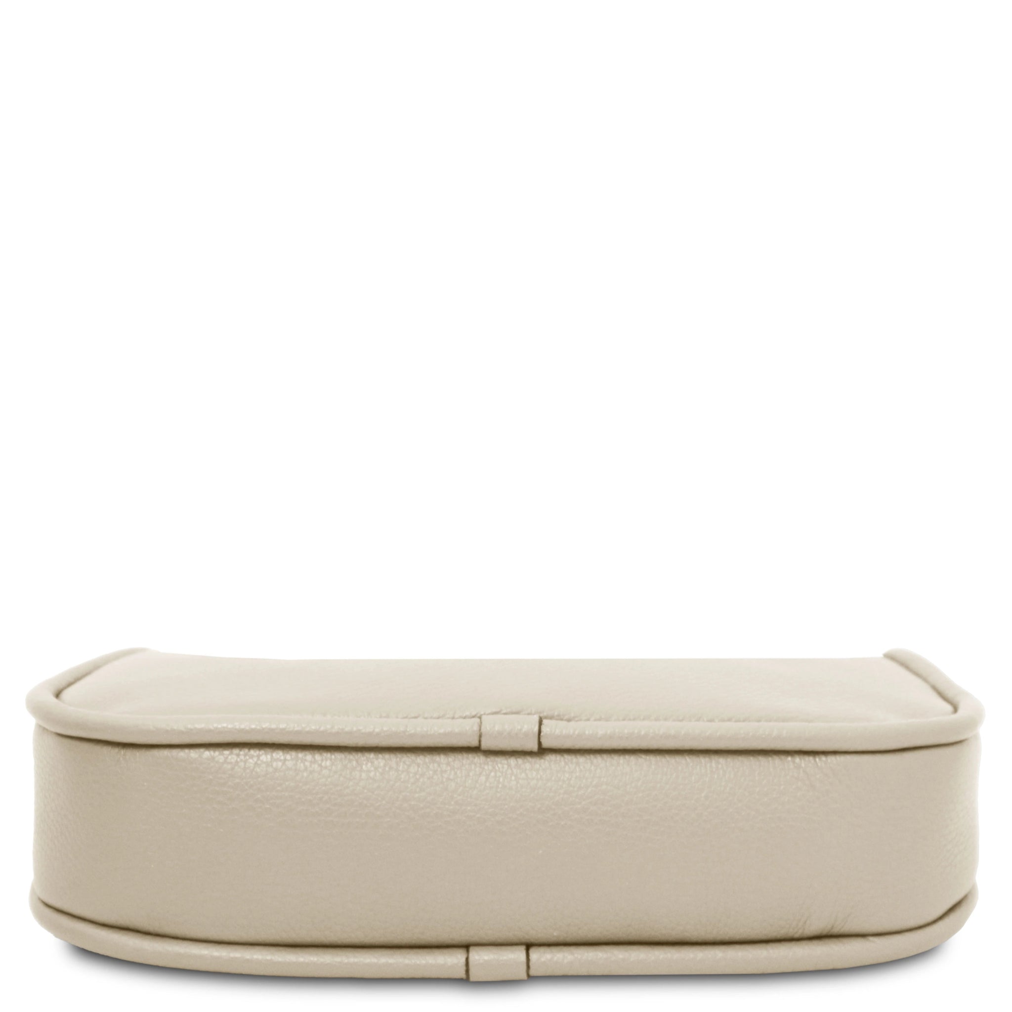 Bottom of beige handbag on a white background