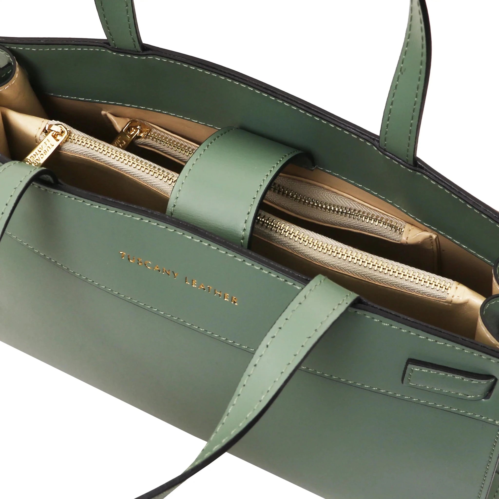Interior zip pockets and magnetic closure view Musa Italian Smooth Leather Tote Bag in mint green with beige lining
