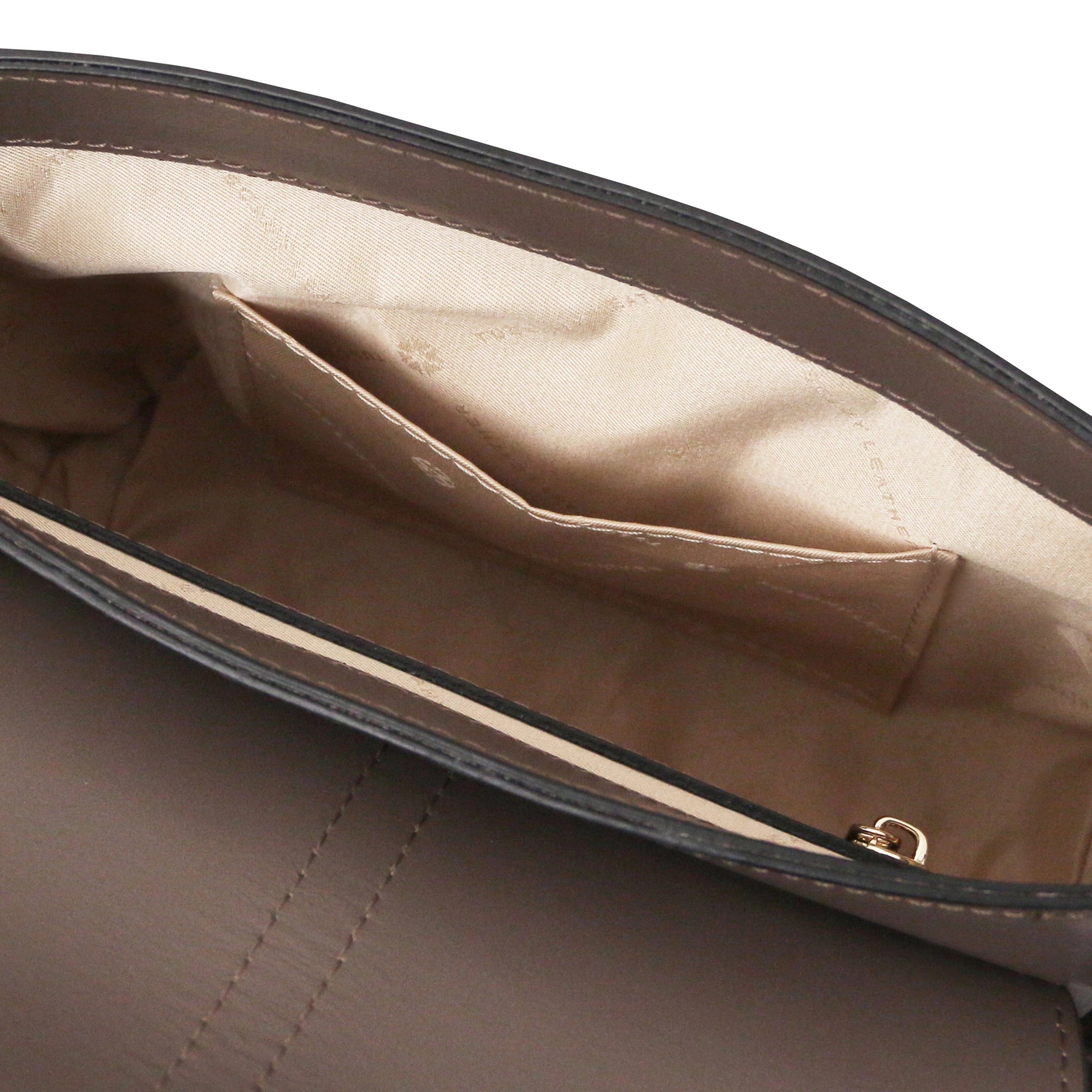 Interior Open Pocket View Nausica Leather Shoulder Bag in dark taupe showing natural bag lining