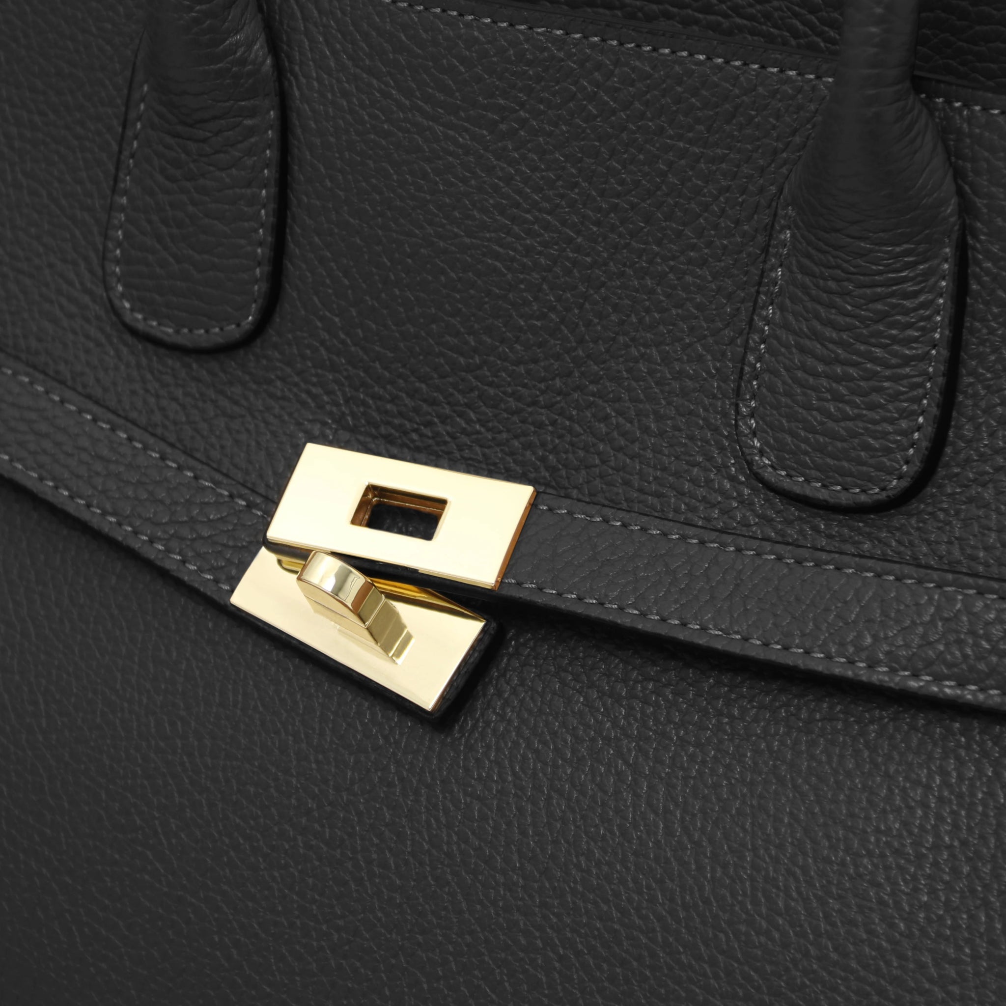 Close up Origami Italian Pebbled Leather Tote in black front gold twist lock