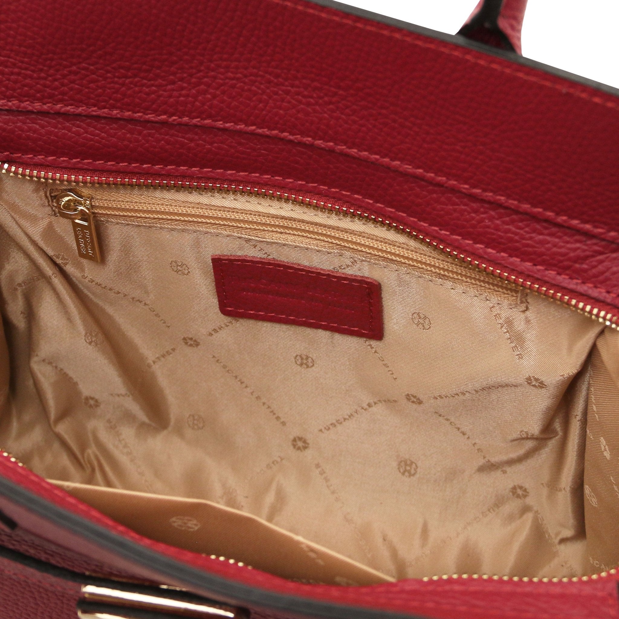 Interior open pocket view Origami Italian Pebbled Leather Tote in red with beige lining
