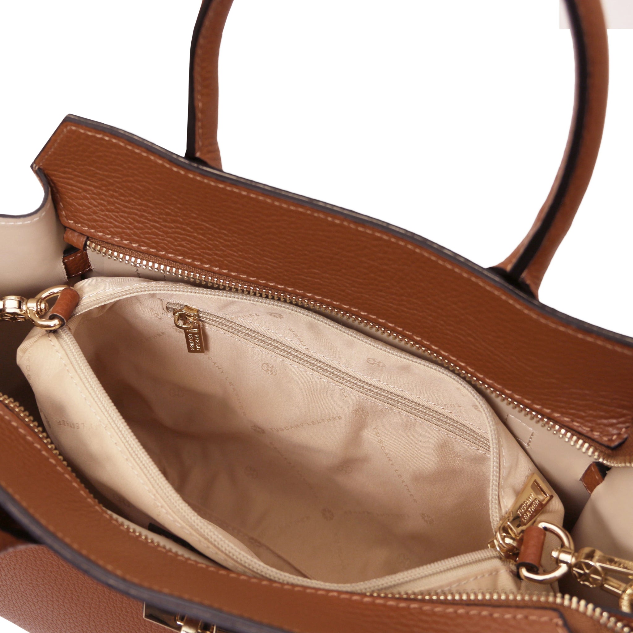 Interior zip pocket view Origami Italian Pebbled Leather Tote in cognac with beige lining