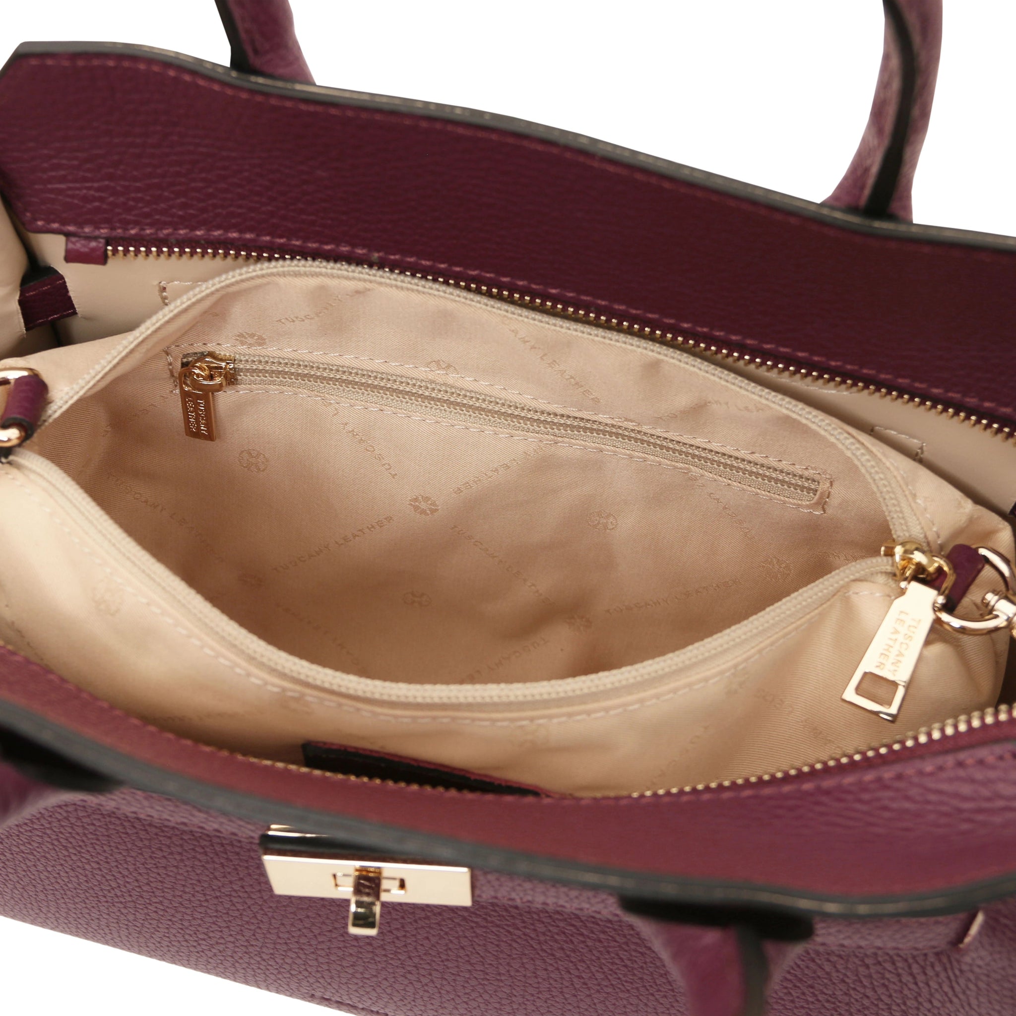 Interior zip pocket view Origami Italian Pebbled Leather Tote in bordeaux with beige lining