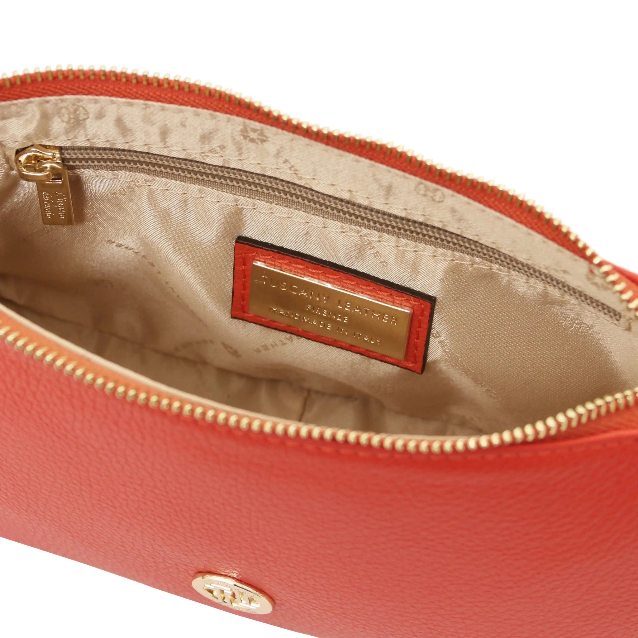 Interior zip pocket view Parfait Leather Clutch in coral with beige lining on white background