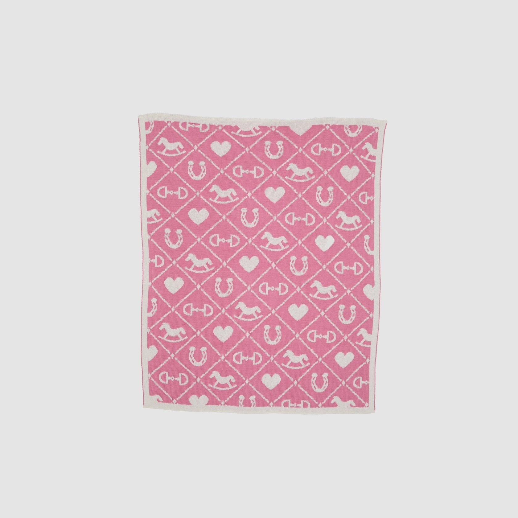 Pony Dreams Reversible Throw in Pink - pink side on a white background