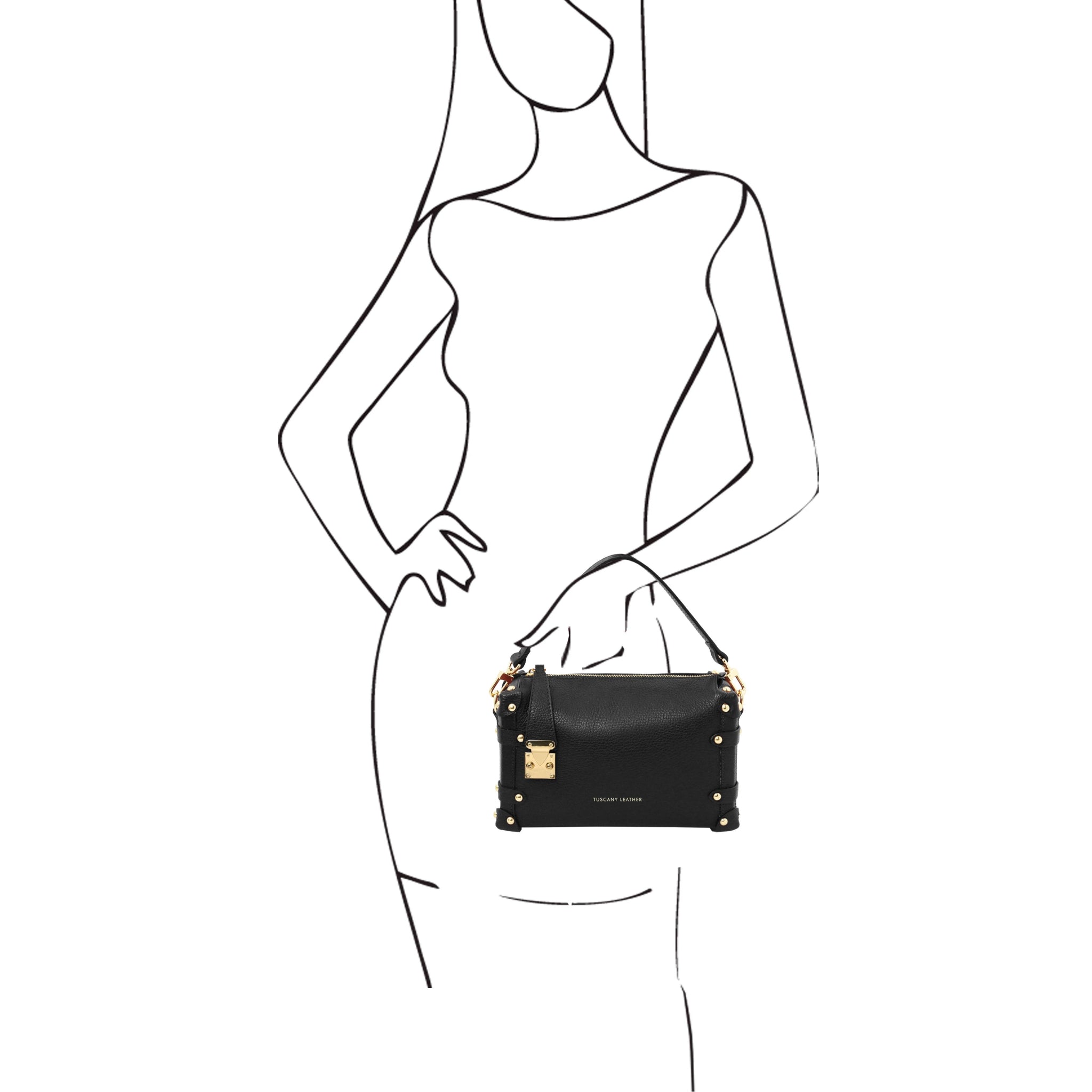 A black and white sketch of a woman holding the Praline Italian Leather Bag in Black