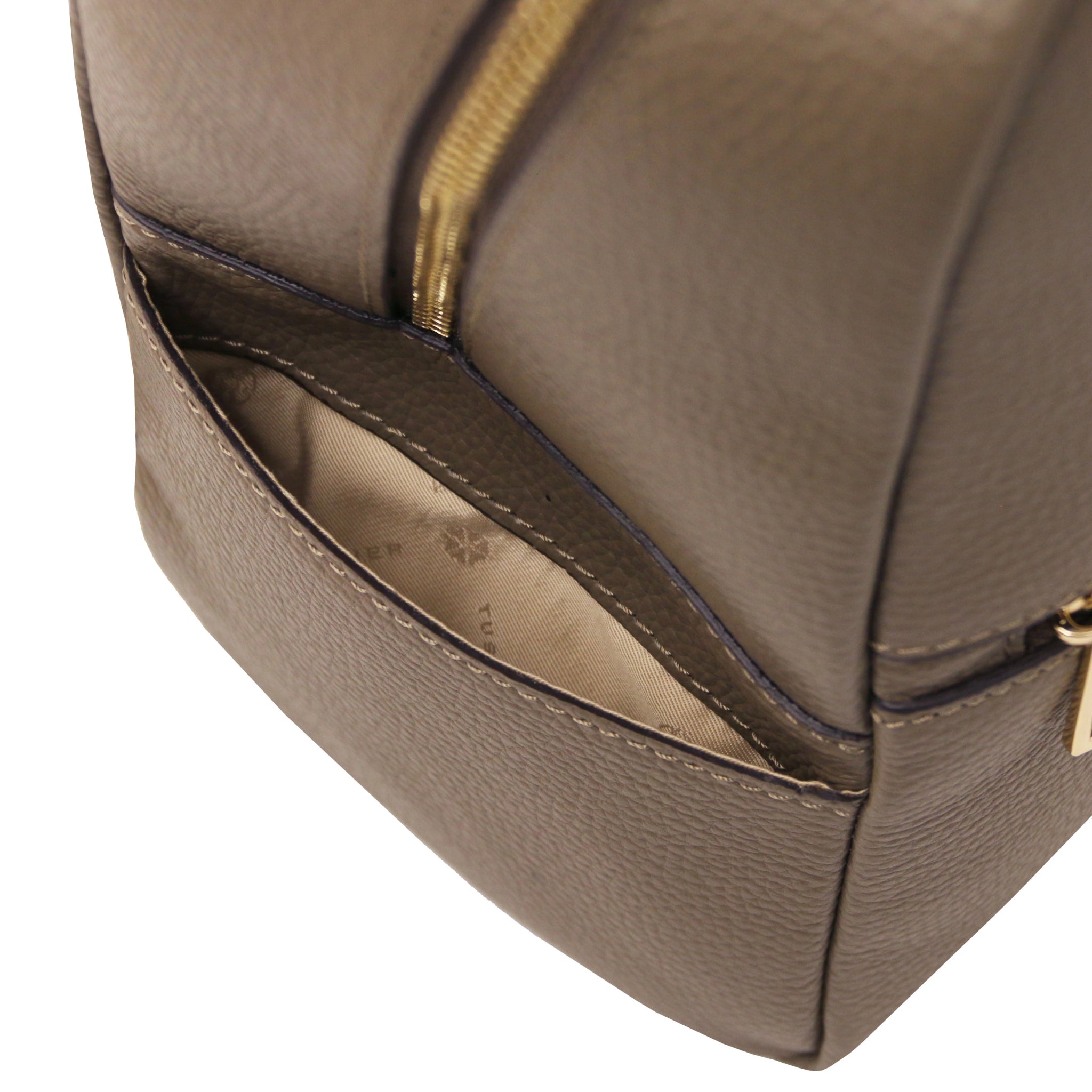 Exterior side open pocket view Prisma Italian Soft Leather Backpack in dark taupe