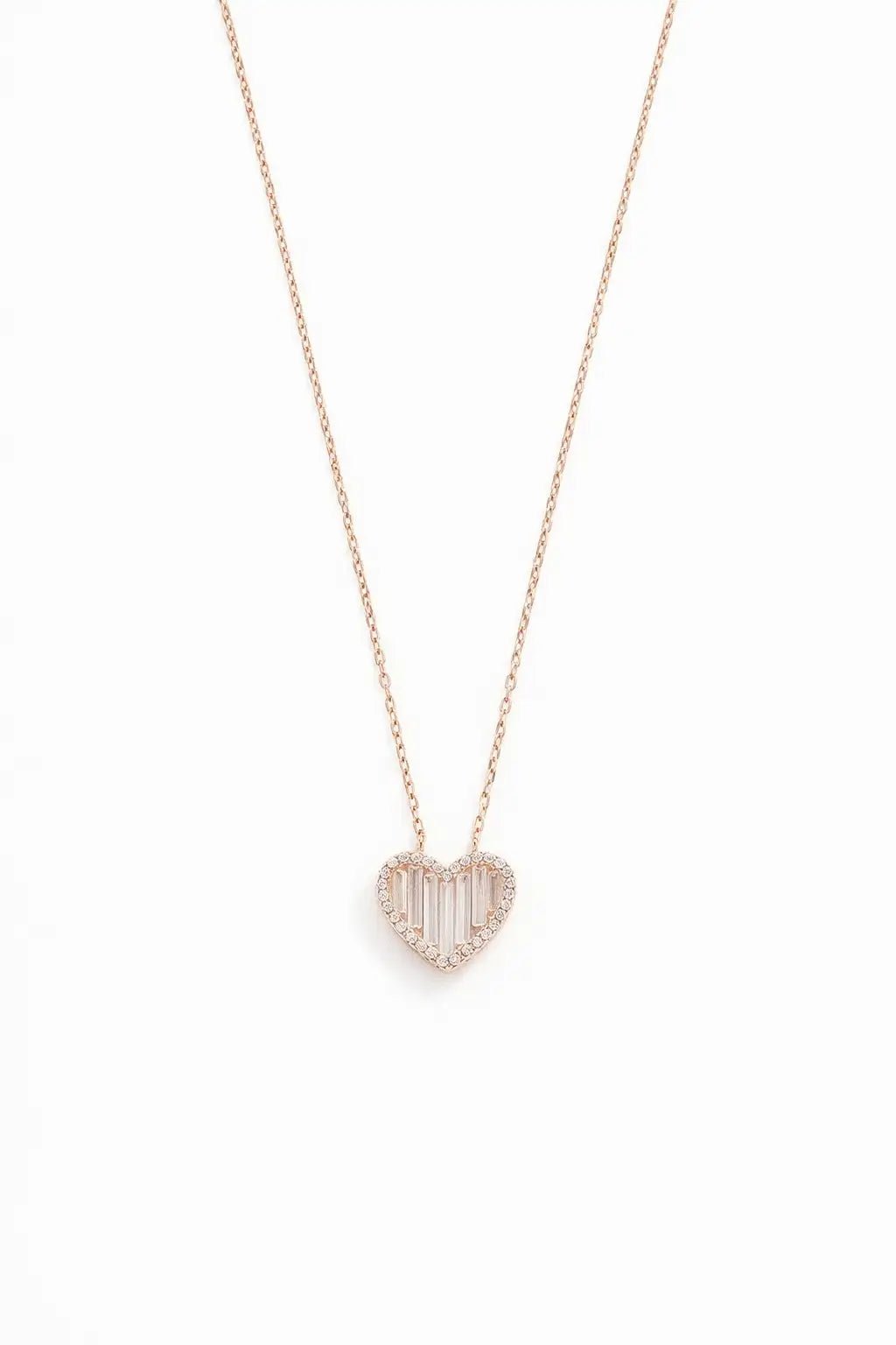 Heart-shaped gold pendant necklace on a white background