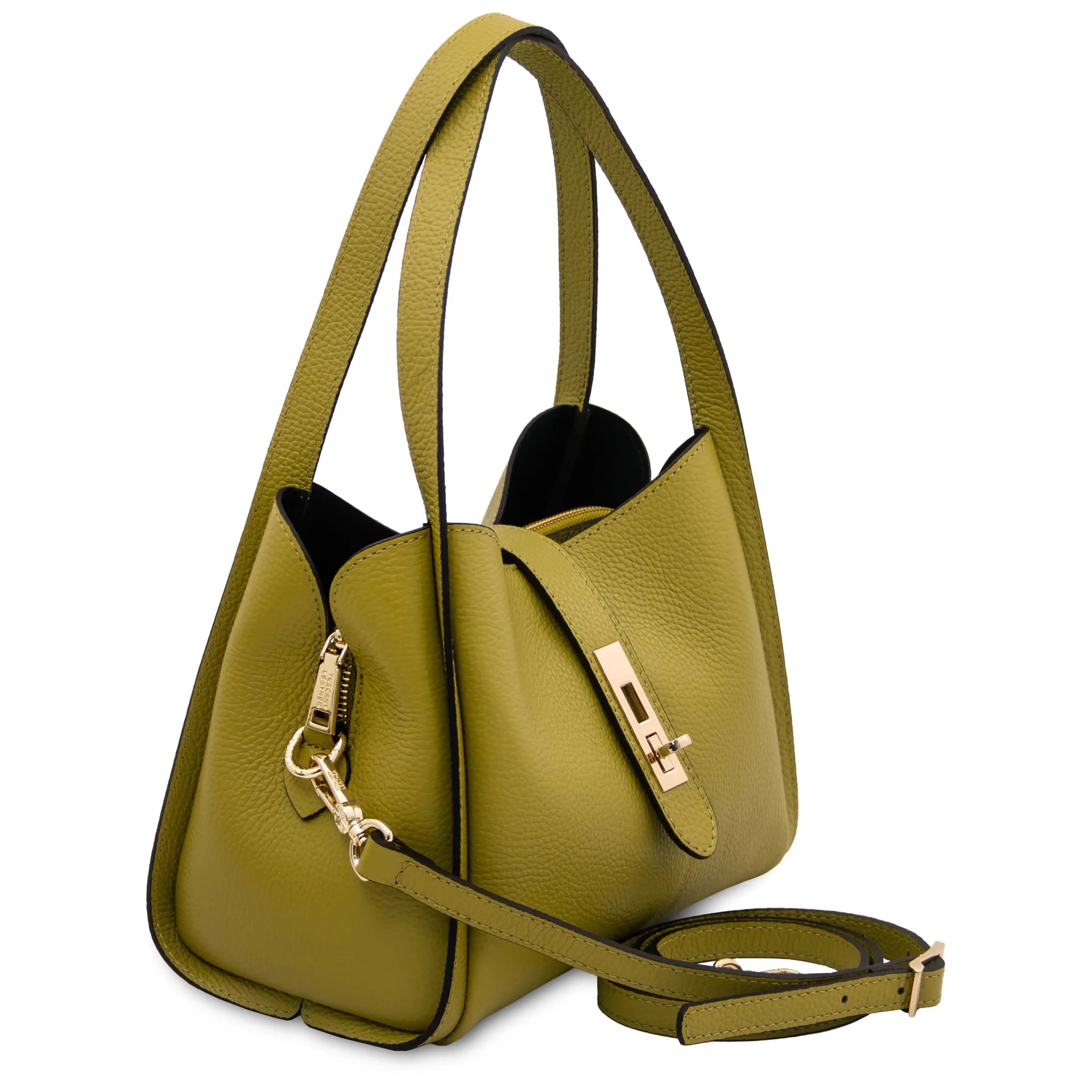 Front angled view Soave Soft Leather Handbag in green with shoulder strap on white background