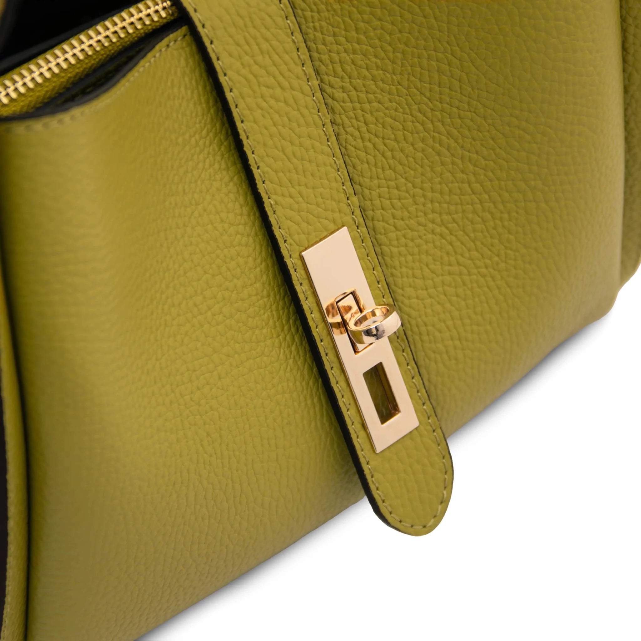 Front angled close up view Soave Soft Leather Handbag in green showing metal twist lock gold hardware