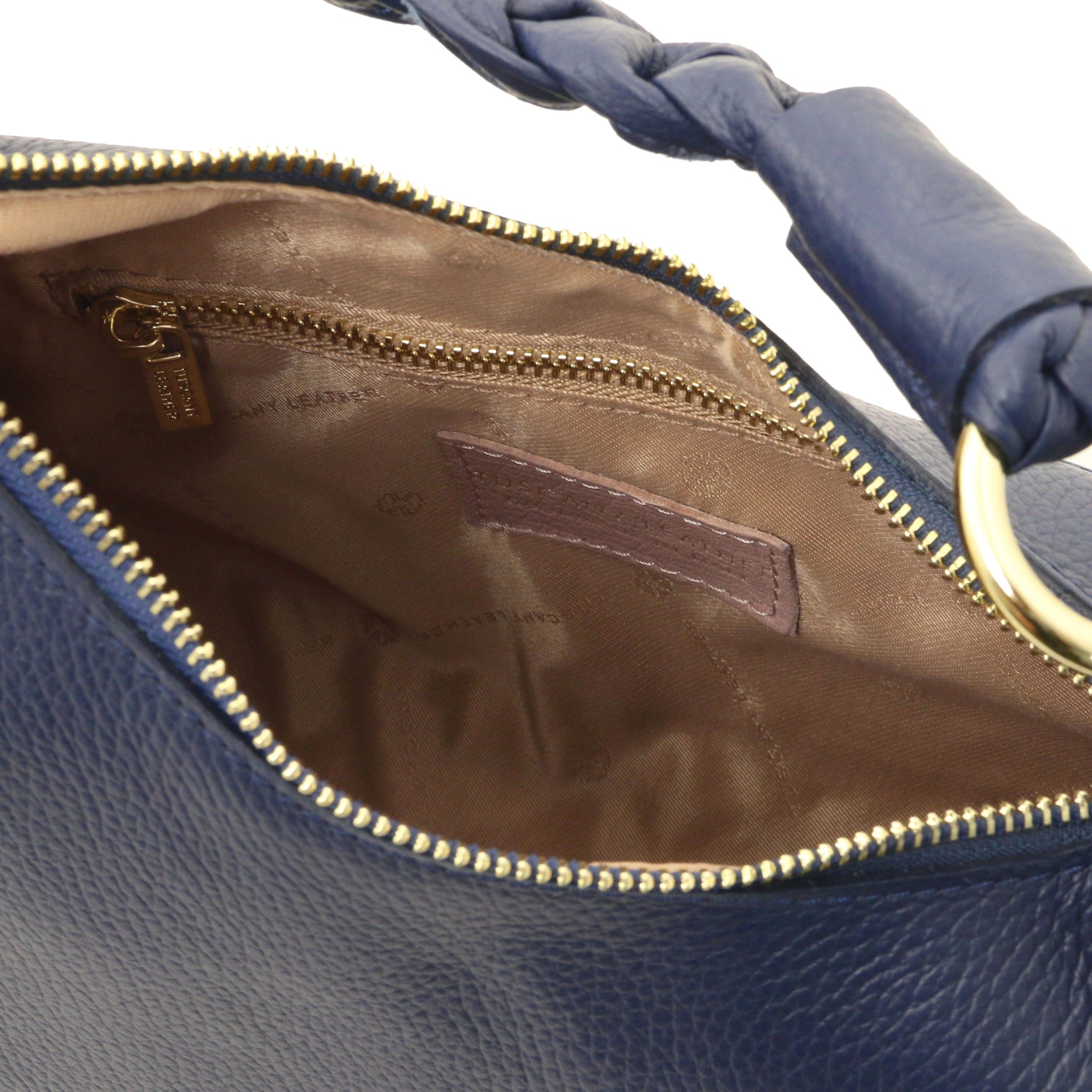 Interior zip pocket view Sophie Italian Leather Shoulder Bag in blue showing tan lining