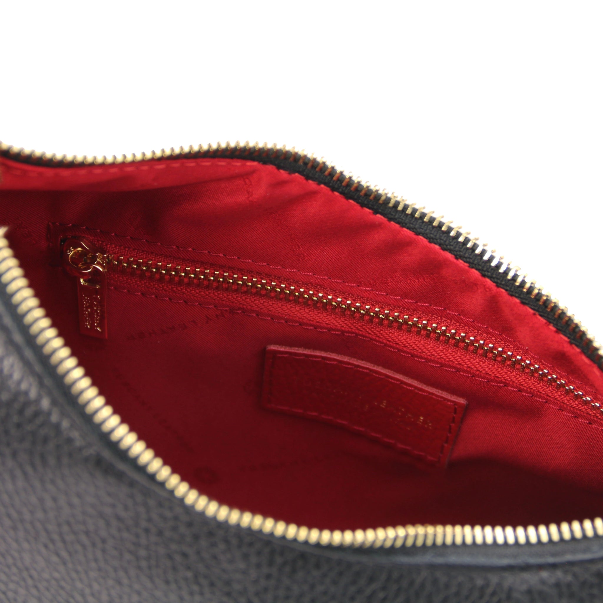 Interior zip pocket view Sophie Italian Leather Shoulder Bag in black showing red lining