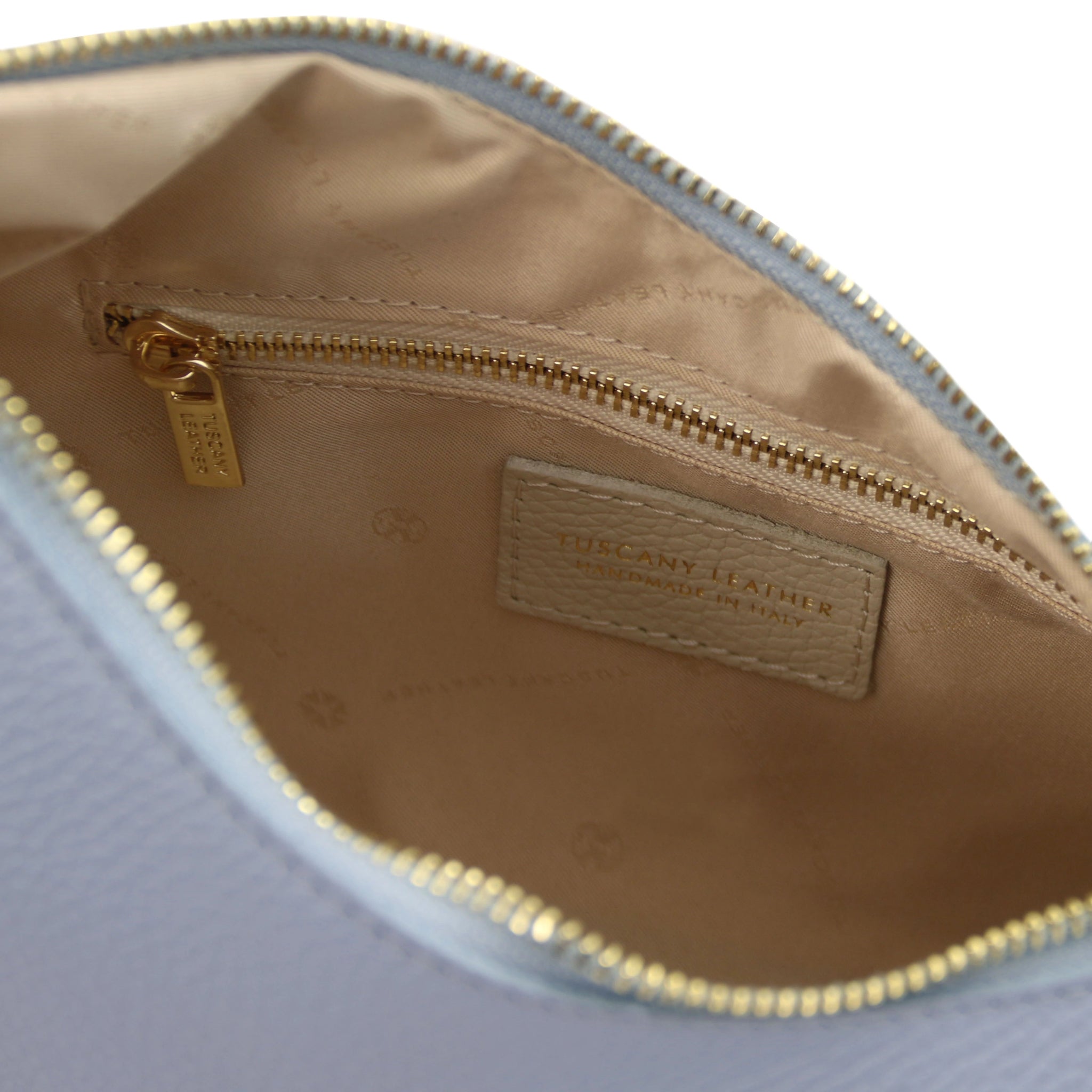 Interior zip pocket view Sophie Italian Leather Shoulder Bag in light blue showing beige lining