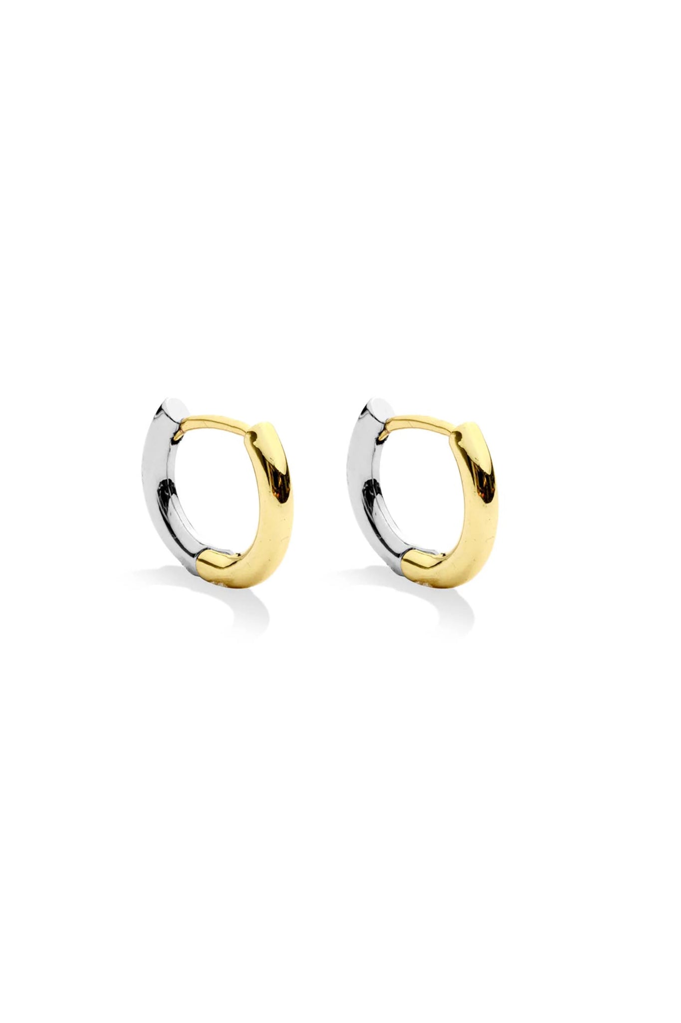Tempe Reversible Mixed Metal Hoops on a white background. Half of the hoop is silver and half gold - L'Atelier Global