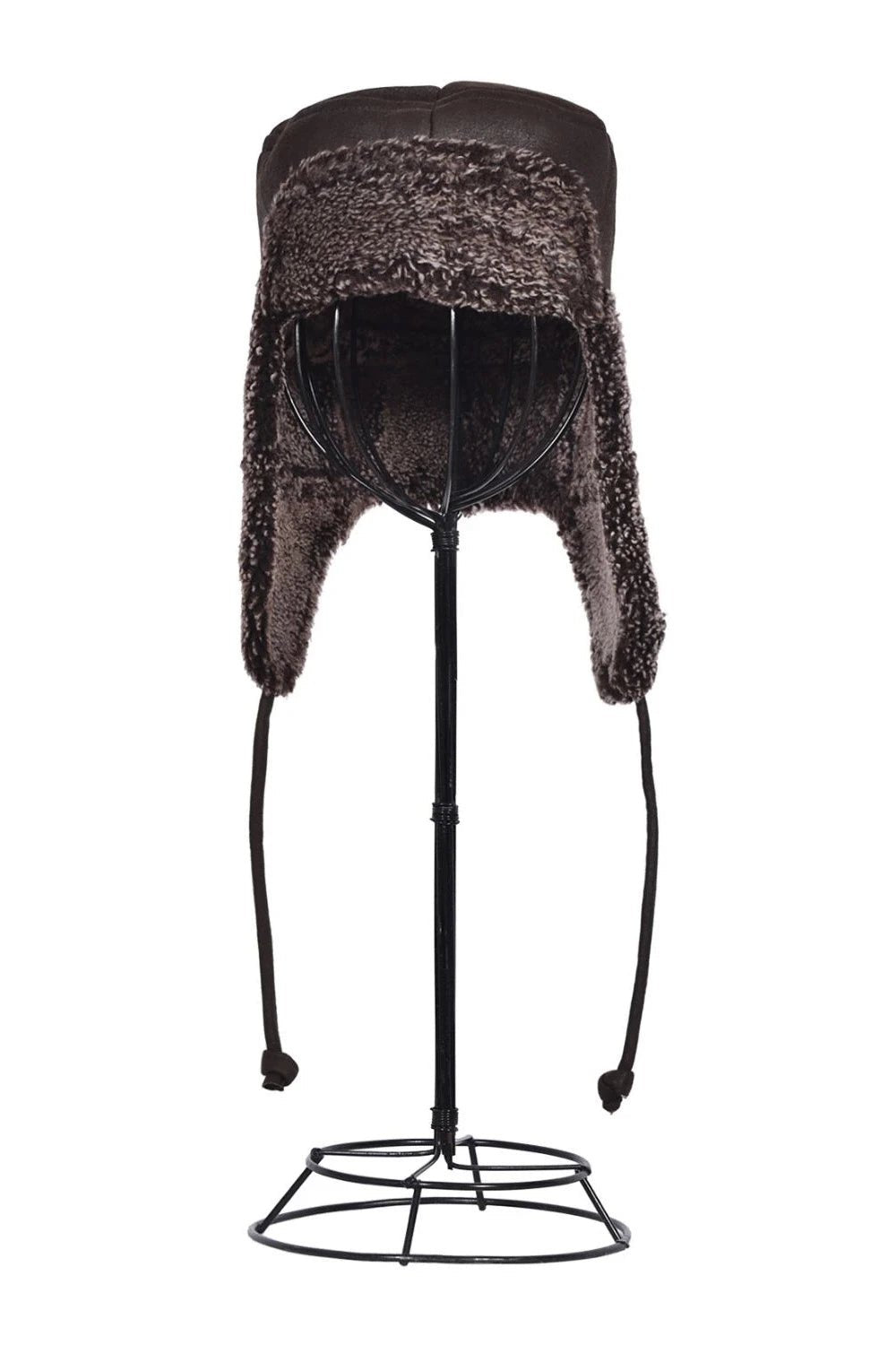 Tie Trapper Sheepskin Ear Flap Hat in Dark Brown on ear flaps down on a black hat stand, front view
