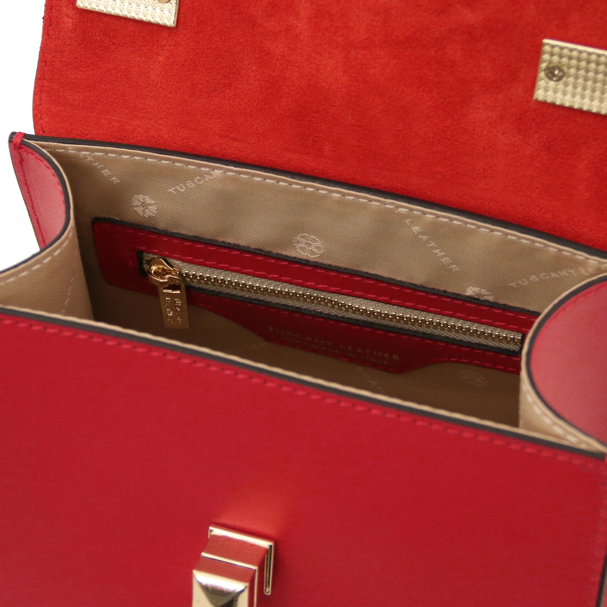 Interior view TL Bag Italian Leather Mini Bag in red showing interior zip pocket and beige lining.