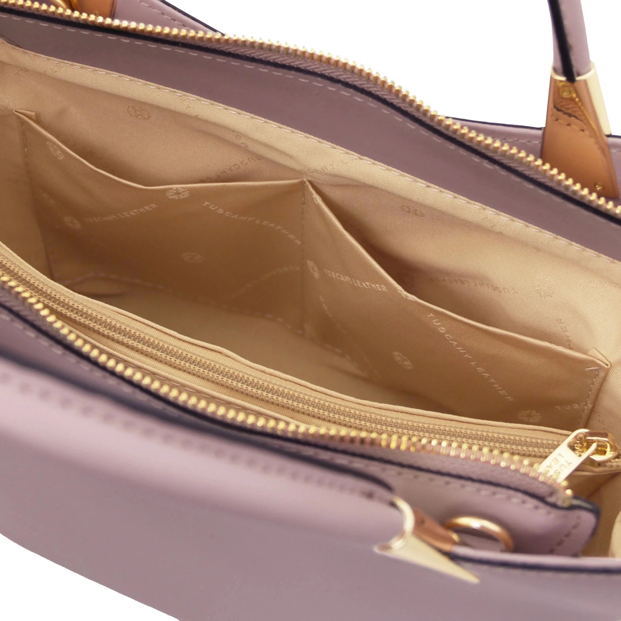 TL Bag in Lilac interior Beige showing centered zippered, beige lining, compartment and open pockets