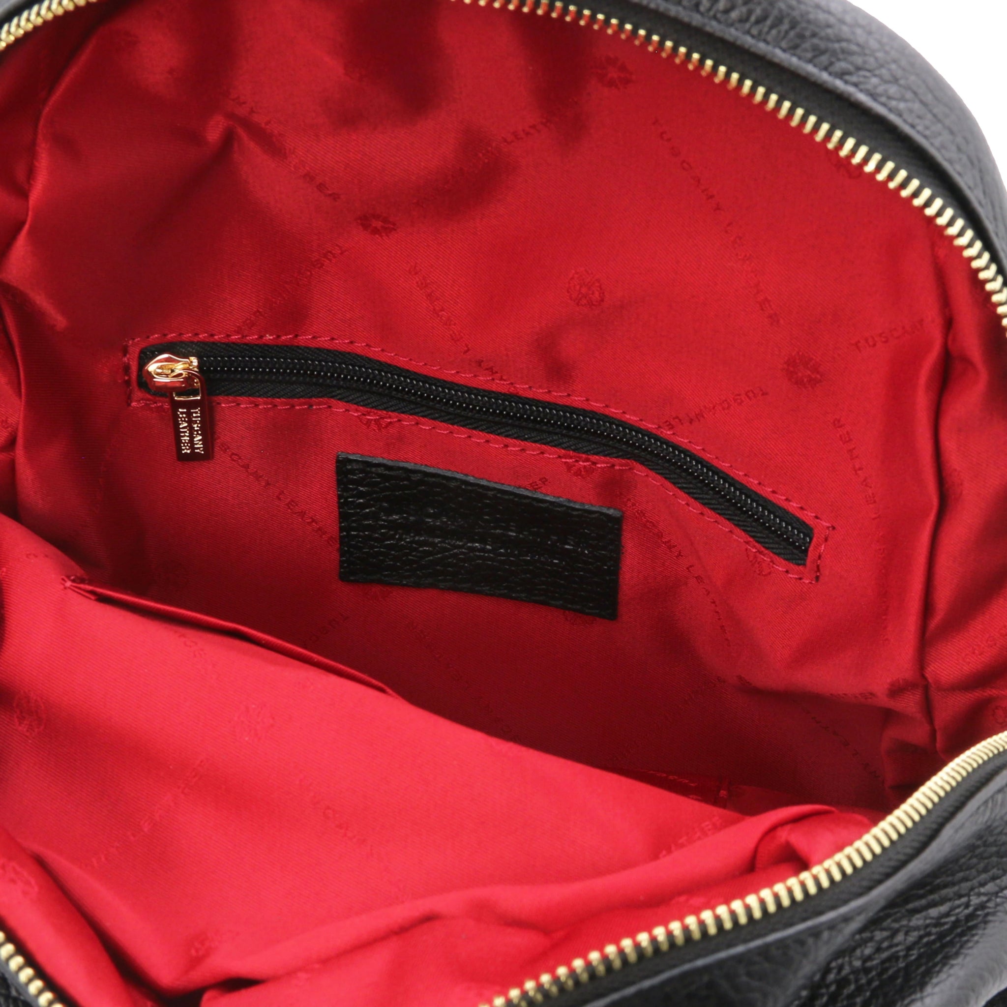 Interior zip pocket view TL Bag Italian Soft Leather Zip Backpack in black showing red lining