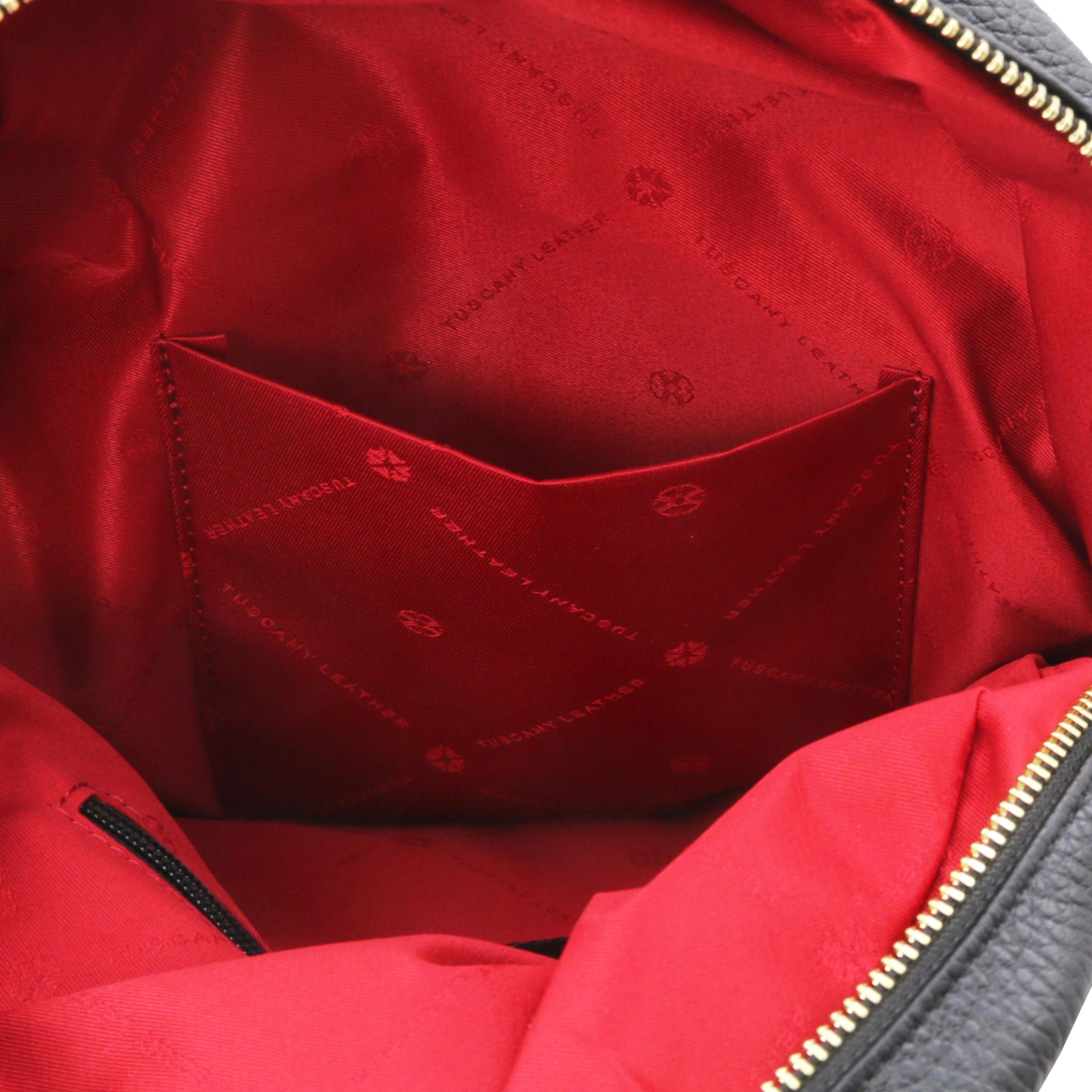 Interior open pocket view TL Bag Italian Soft Leather Zip Backpack in black showing red lining