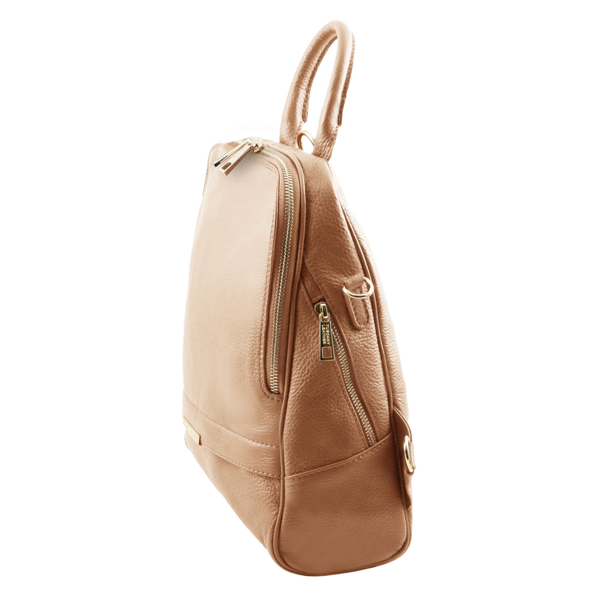 Side view of TL Bag Soft Leather Backpack in champagne showing side zip pocket and main zip entry