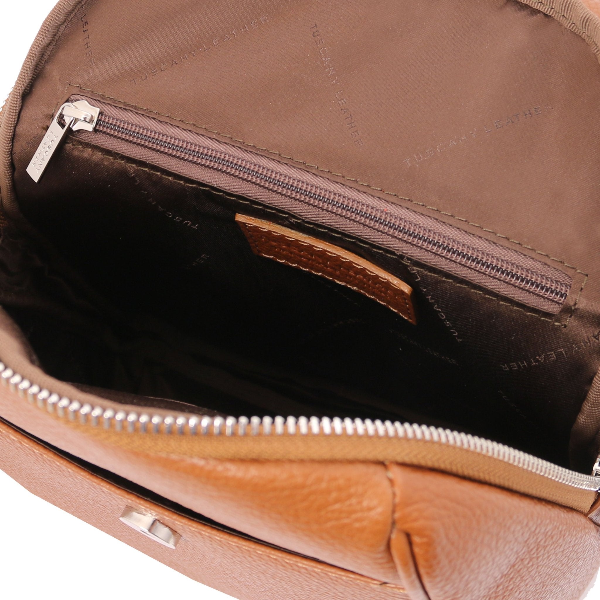 Interior zip pocket view TL Bag Soft Italian Leather Backpack in cognac showing brown lining
