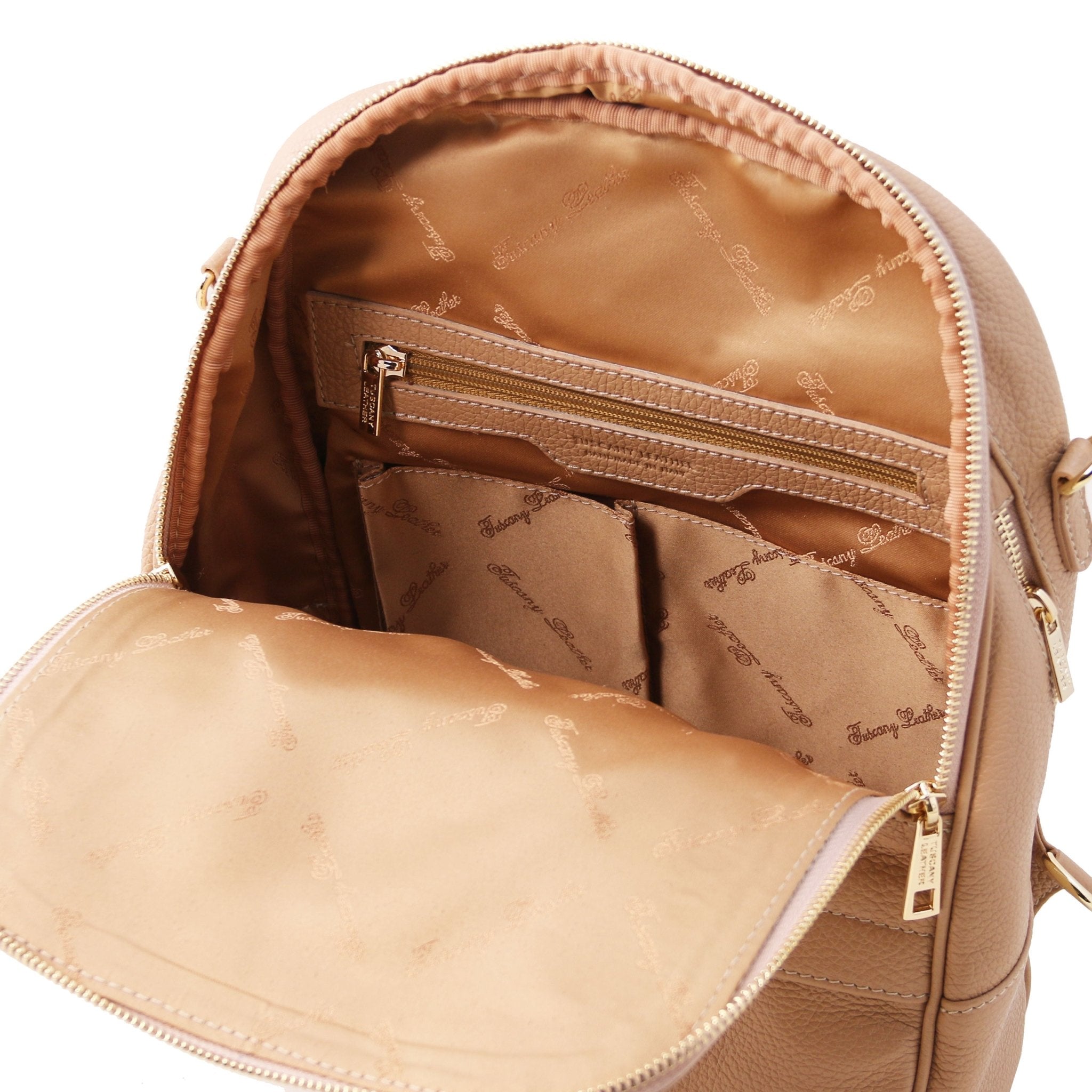 Interior pockets view of TL Bag Soft Leather Backpack in champagne on a white background showing matching interior lining