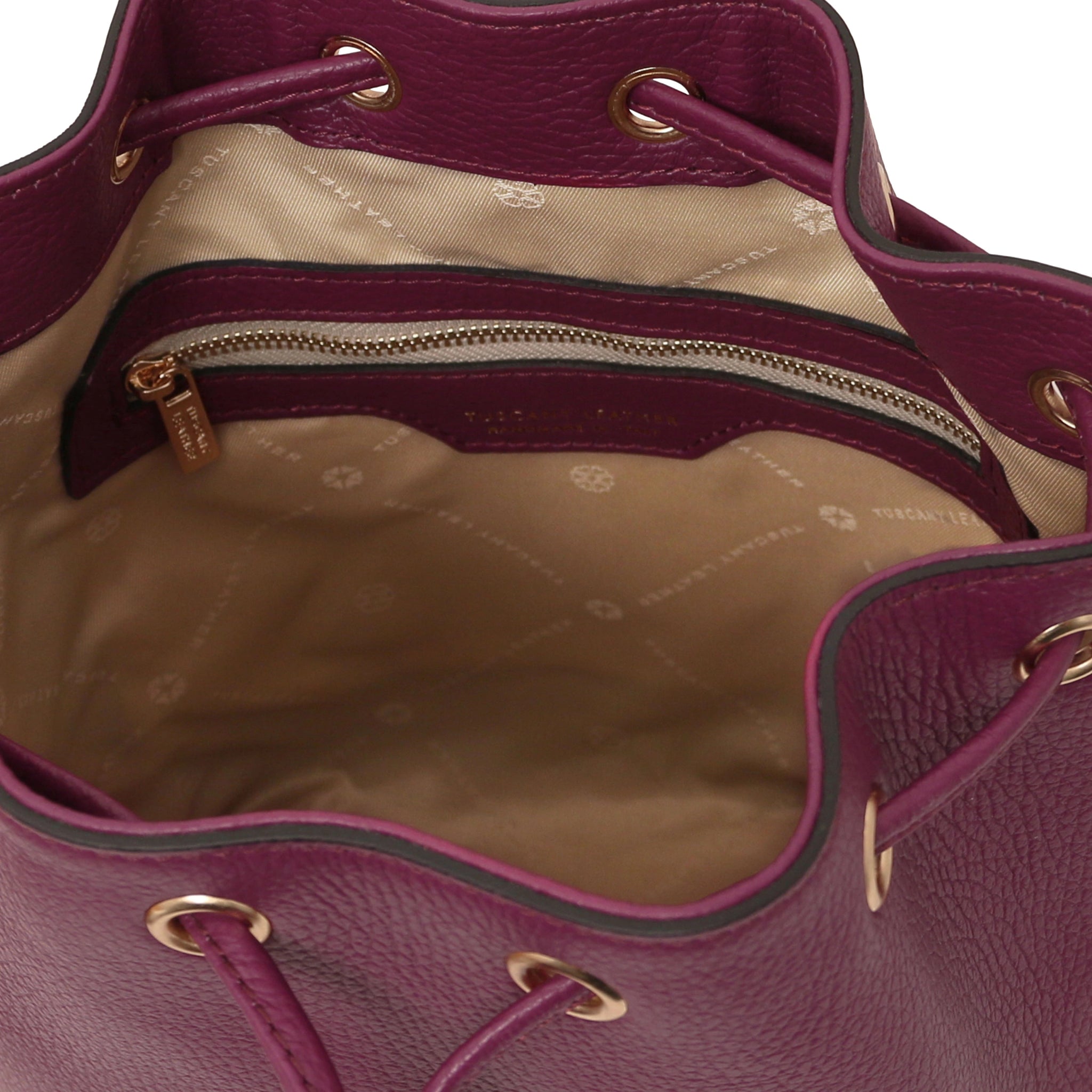 Interior zip pocket view TL Italian Leather Bucket Bag in bordeaux with beige lining