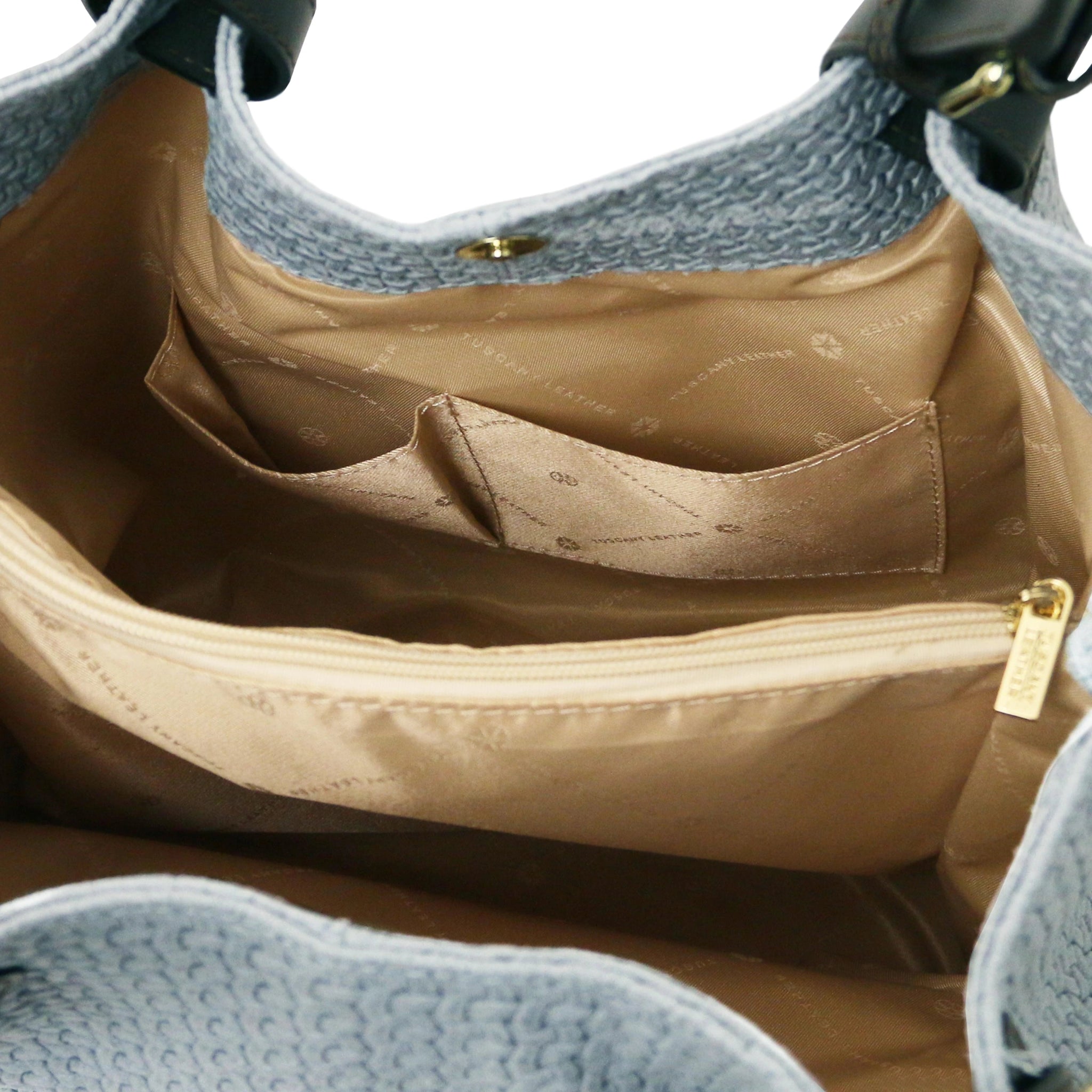 Interior open pockets view of the TL Keyluck Woven Printed Leather Shopping Bag in Light Blue showing beige interior