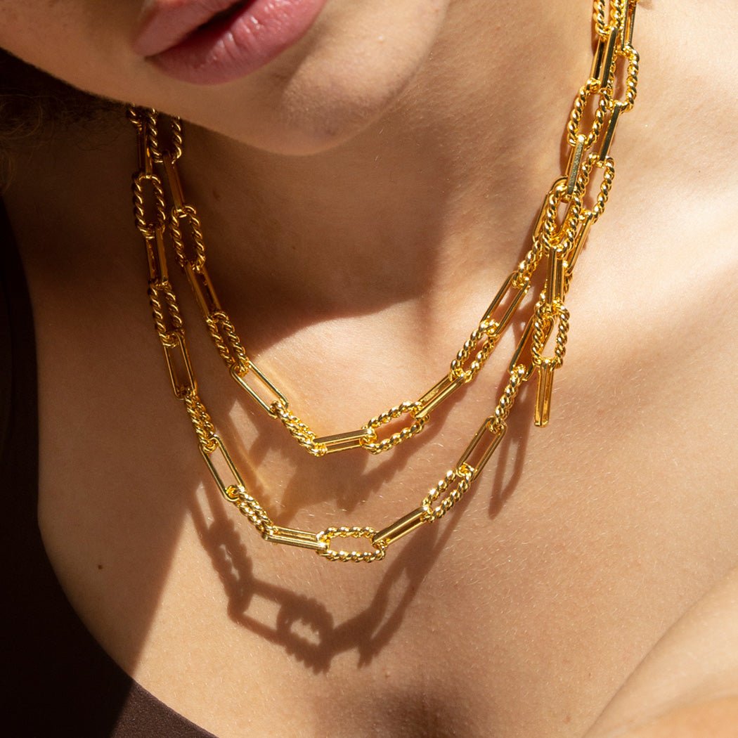 Vintage Glam Gold Vermeil Necklace on a model wearing two chains at different lengths, close up image of chains.
