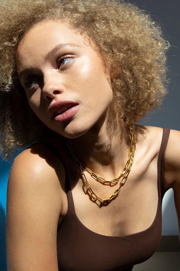 Vintage Glam Gold Vermeil Necklace on a model wearing two chains at different lengths - L'Atelier Global
