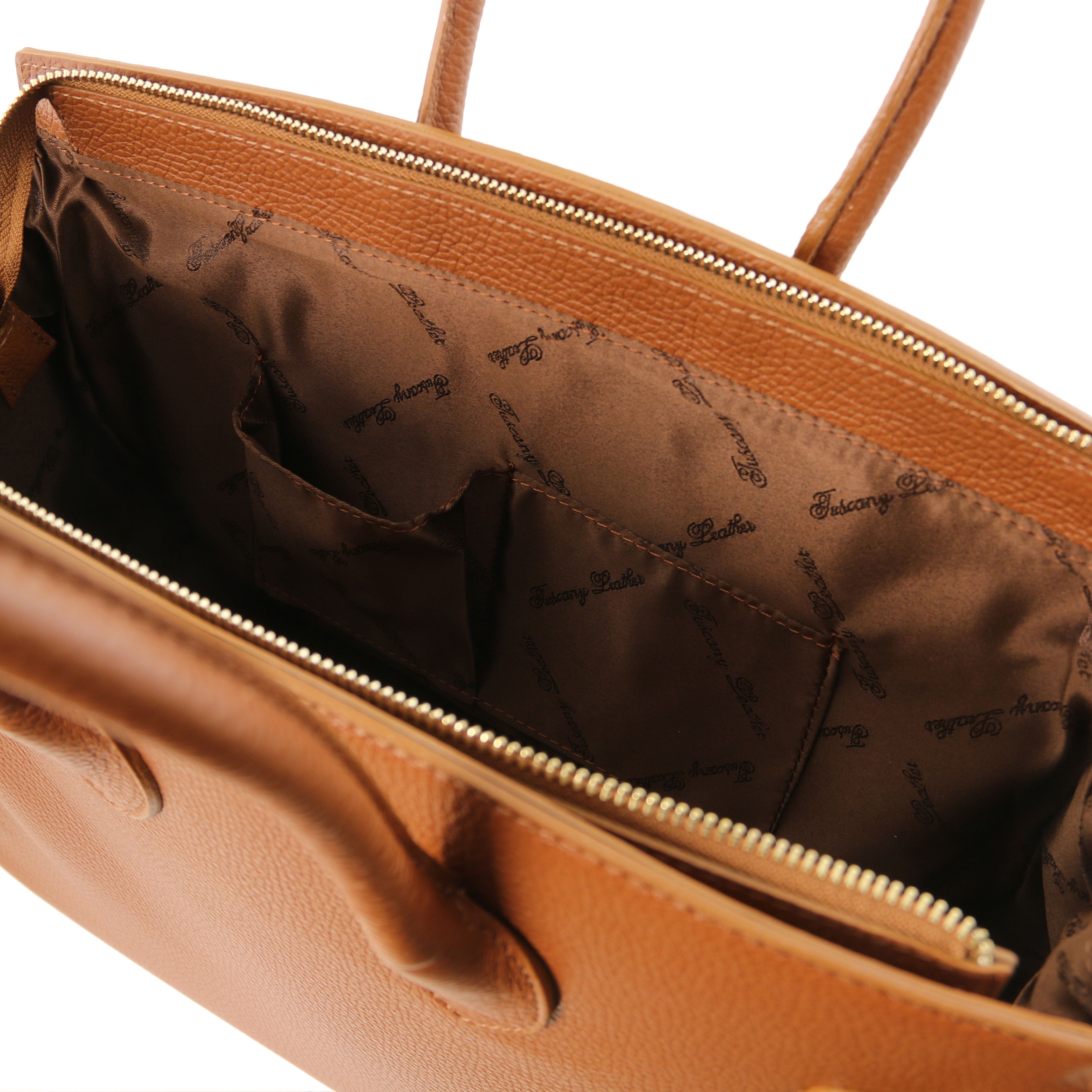 TL Italian Leather Handbag with Golden Hardware in cognac, interior view of open pockets, light brown lining, white background