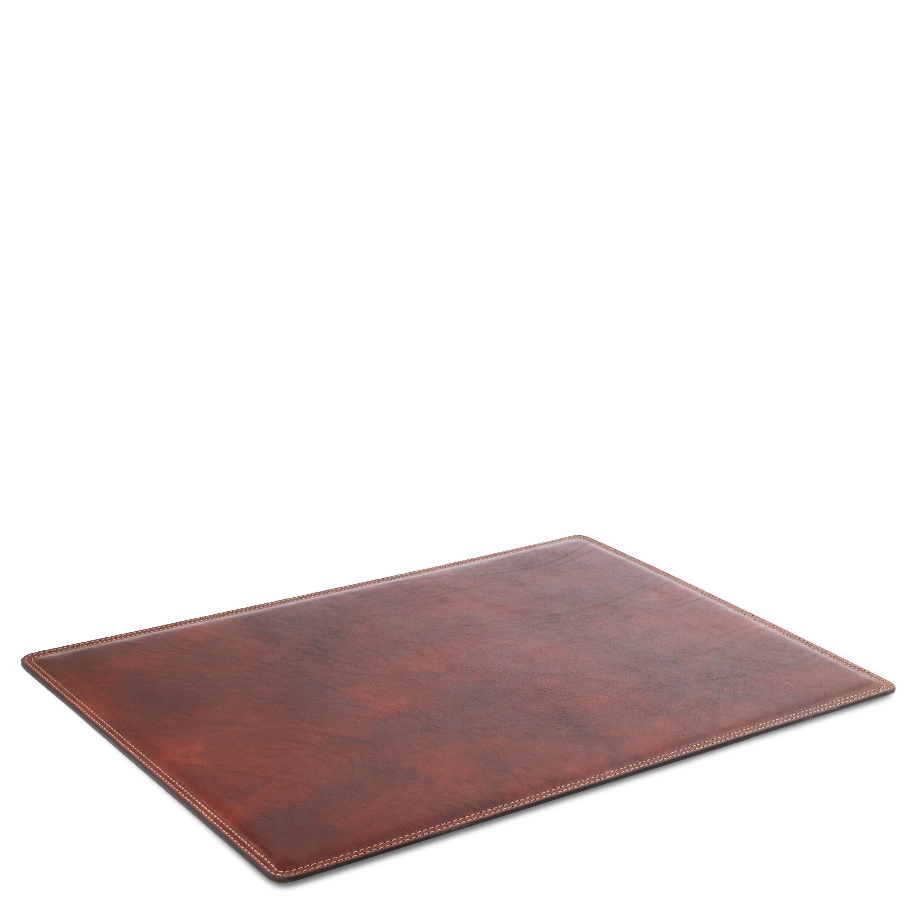 Leather Desk Pad in Brown laying down on a white background and surface