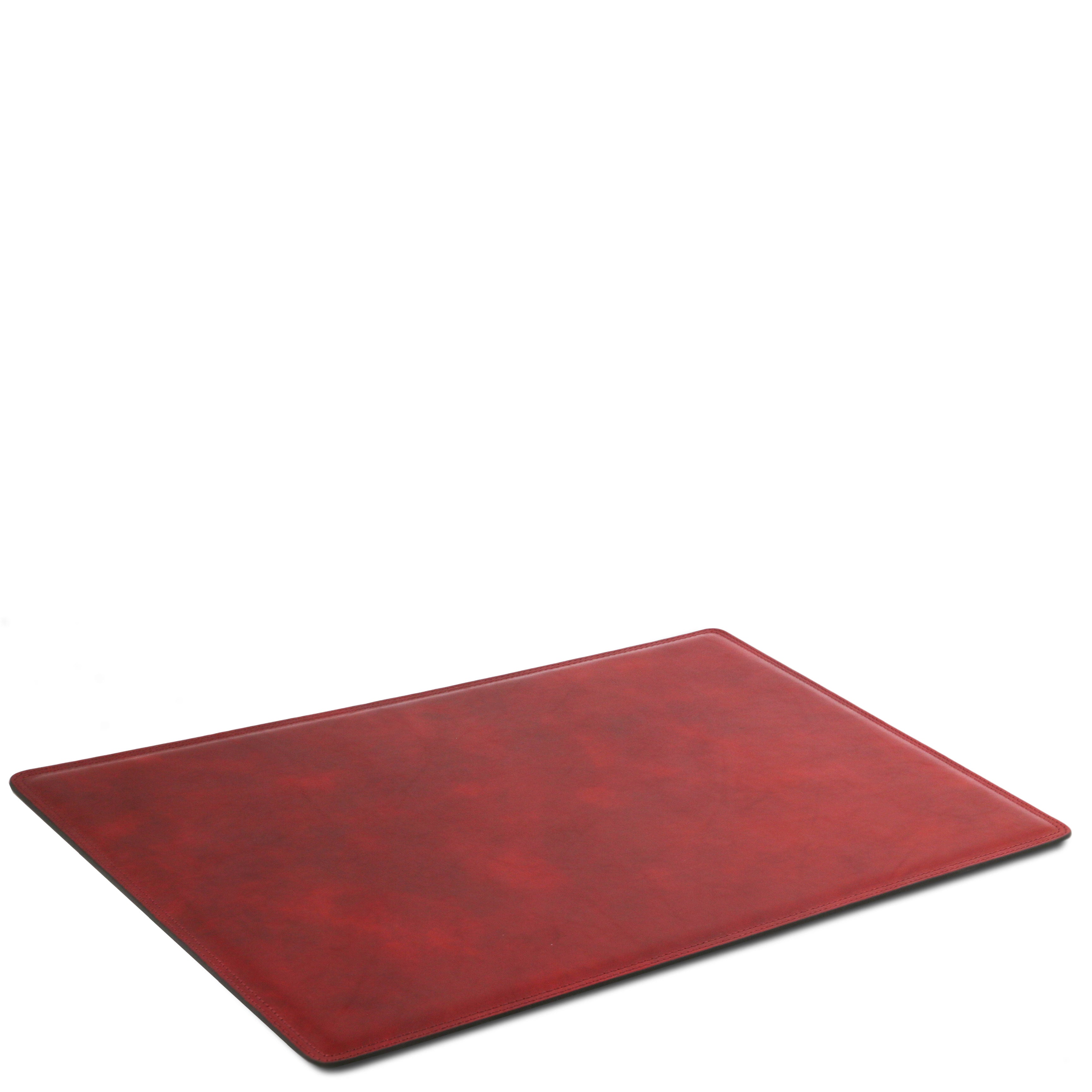 Leather Desk Pad in Red laying down on a white background and surface
