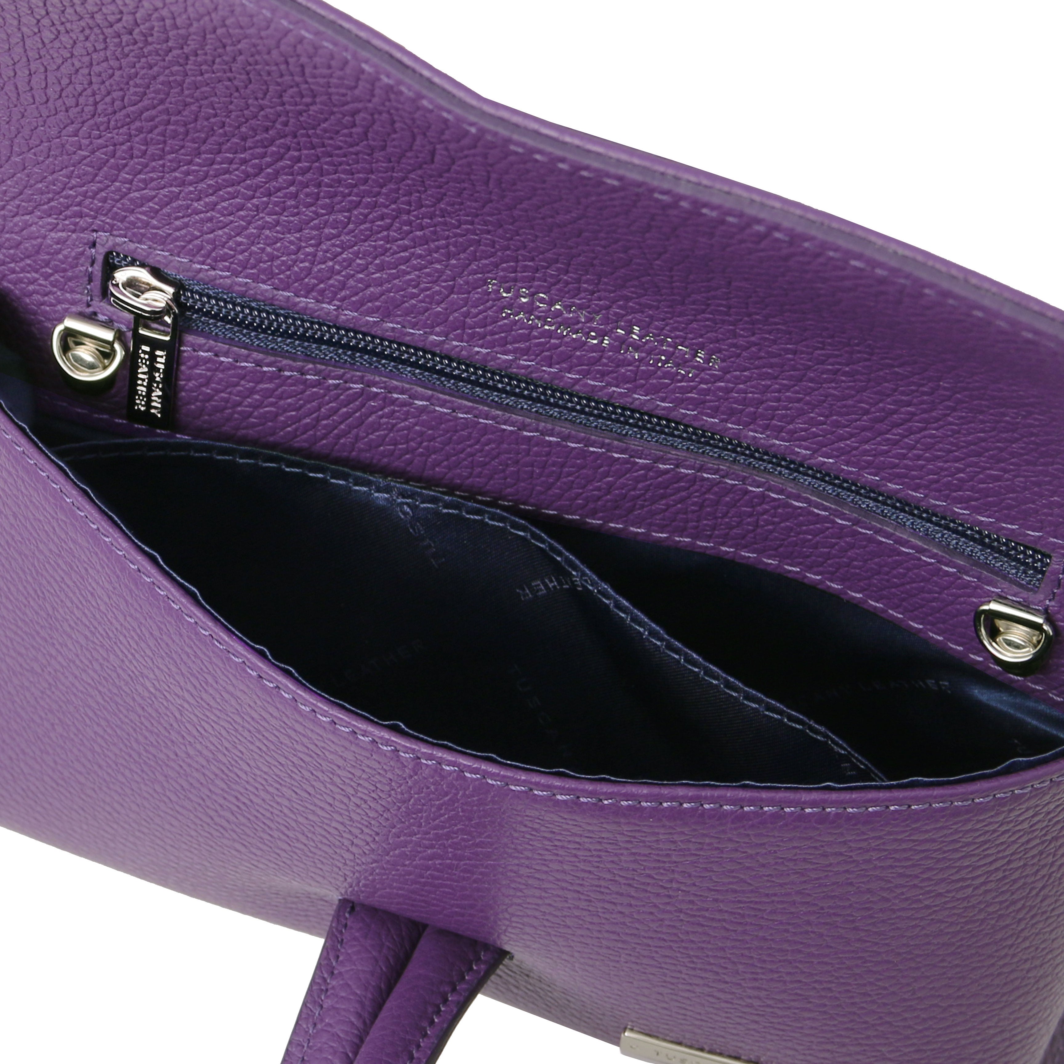 Interior open pocket view TL Bag Leather Clutch in purple showing brown lining