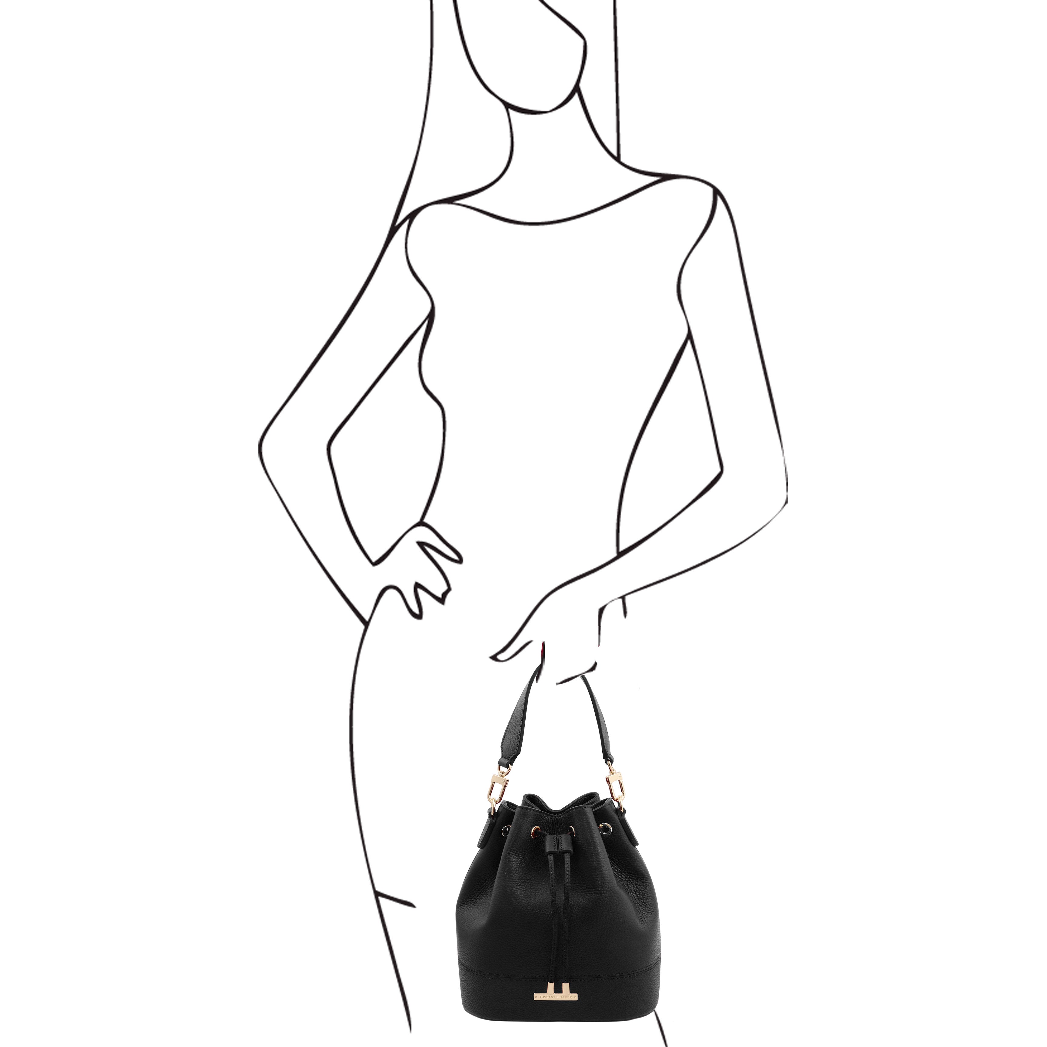 Black sketch on a white background of woman holding the TL Leather Bucket Bag in Black