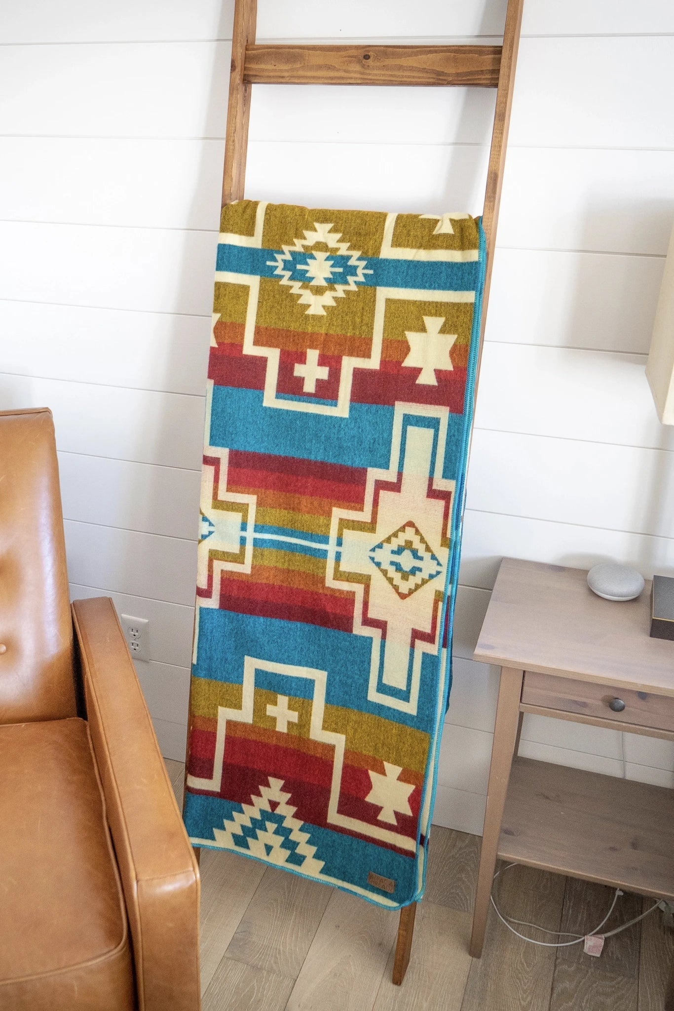 Andean Santa Fe Alpaca Wool Blanket on a wooden ladder leaning on white wall - L'Atelier Global